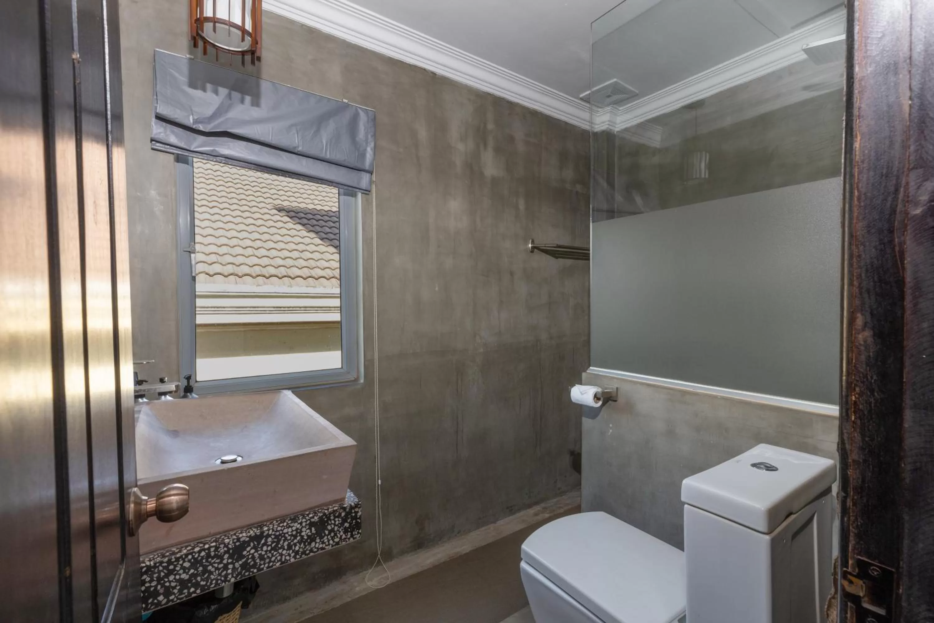 Toilet in The Five Senses Boutique Hotel