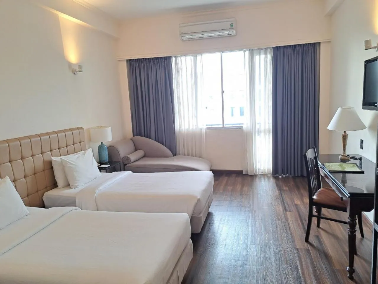 Seating area, Bed in Liberty 2 Hotel