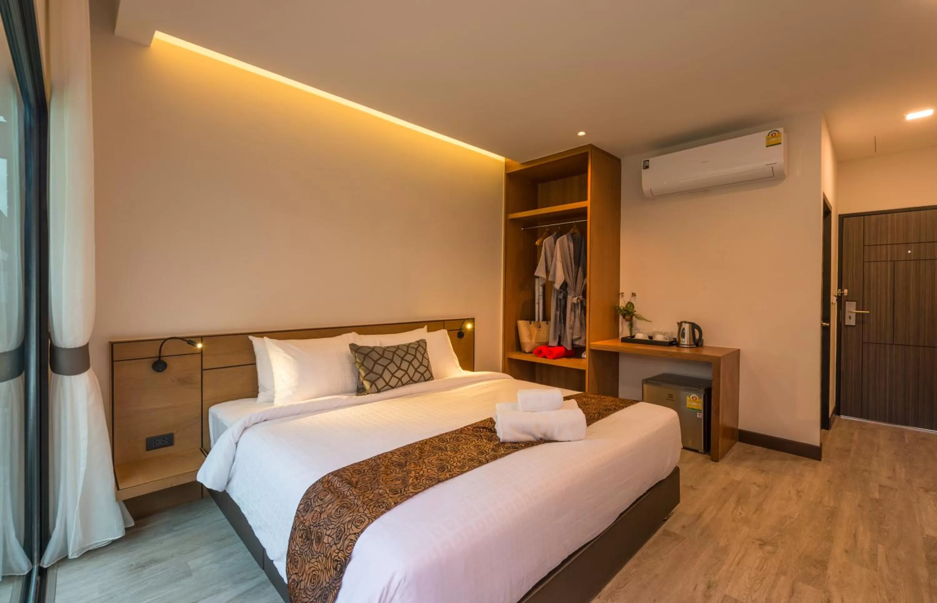 Bed in Cher​mantra​ Aonang​ Resort & Pool​ Suite