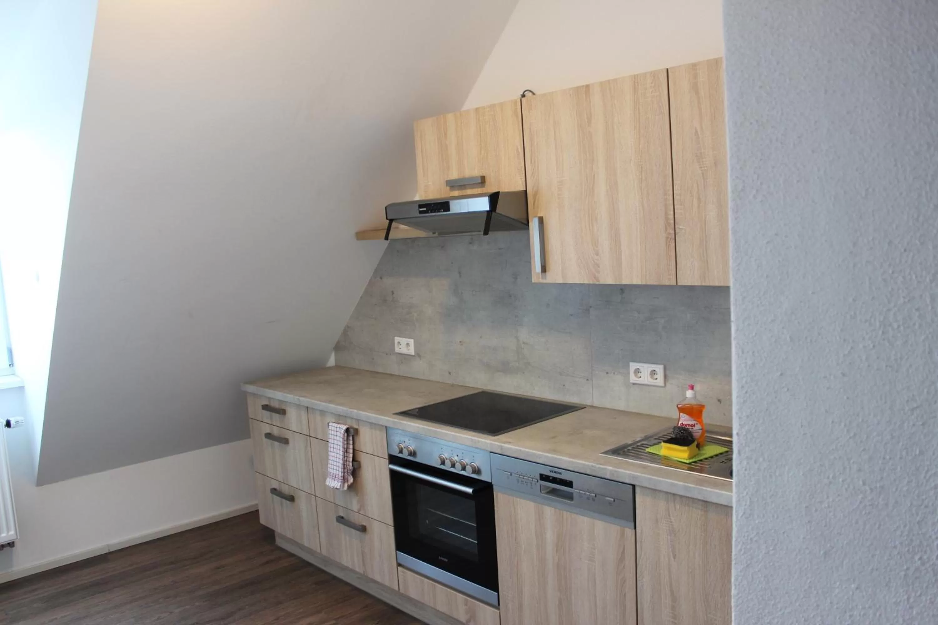 Kitchen or kitchenette in greenpartment Boardinghouse Neustadt