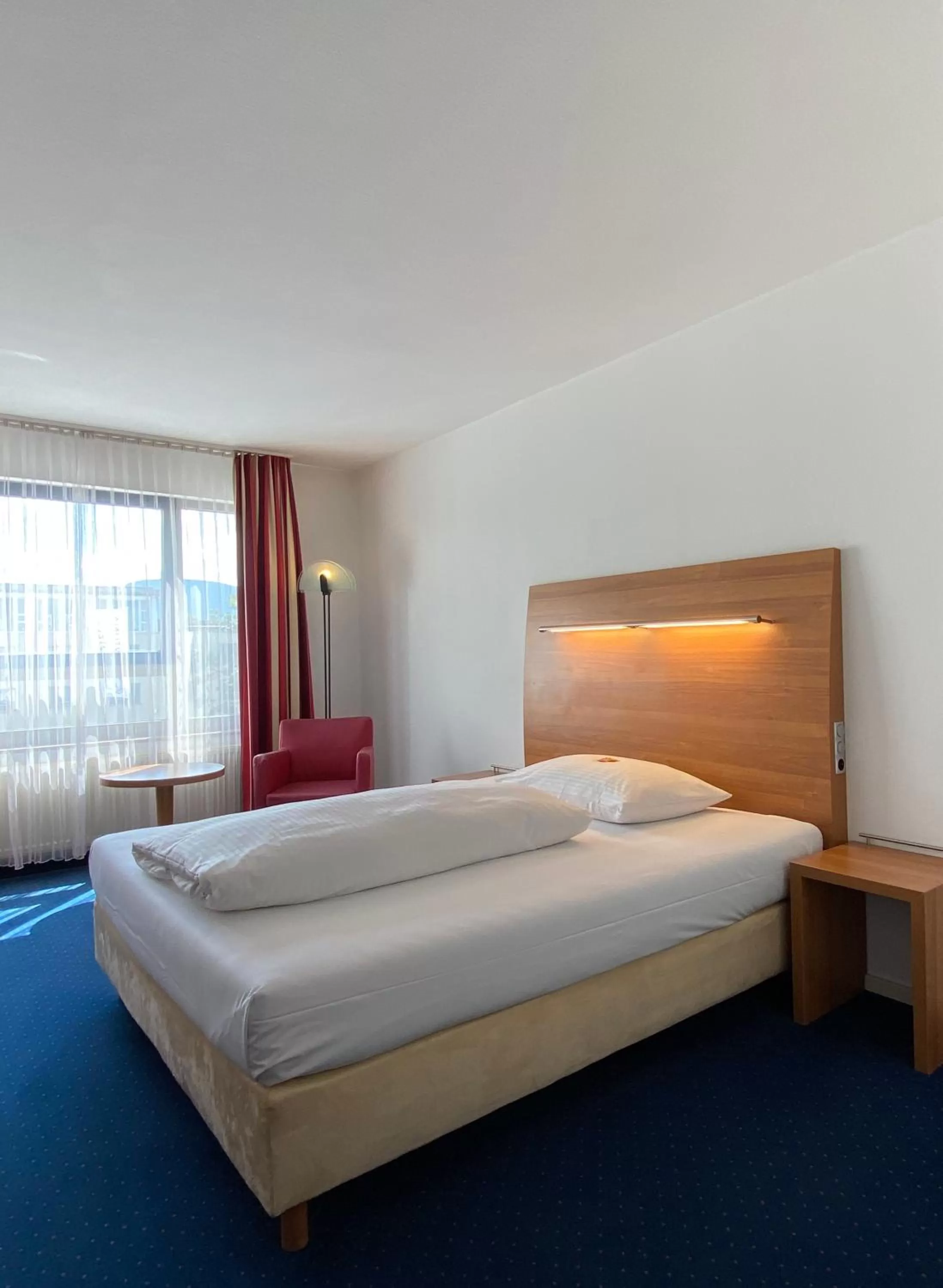 Photo of the whole room, Bed in City Hotel Fortuna Reutlingen