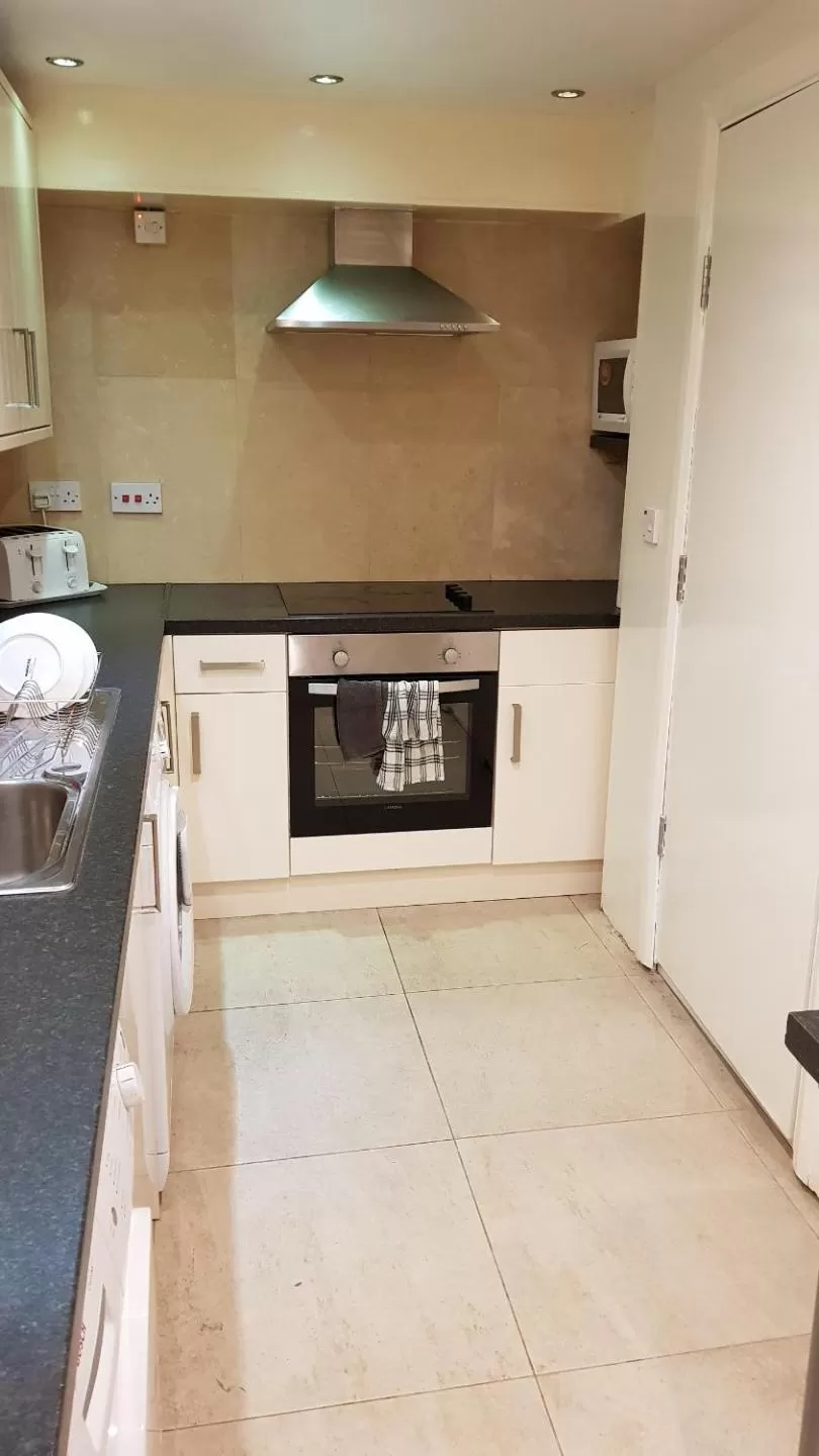 Communal kitchen in Hour Glass Hotel