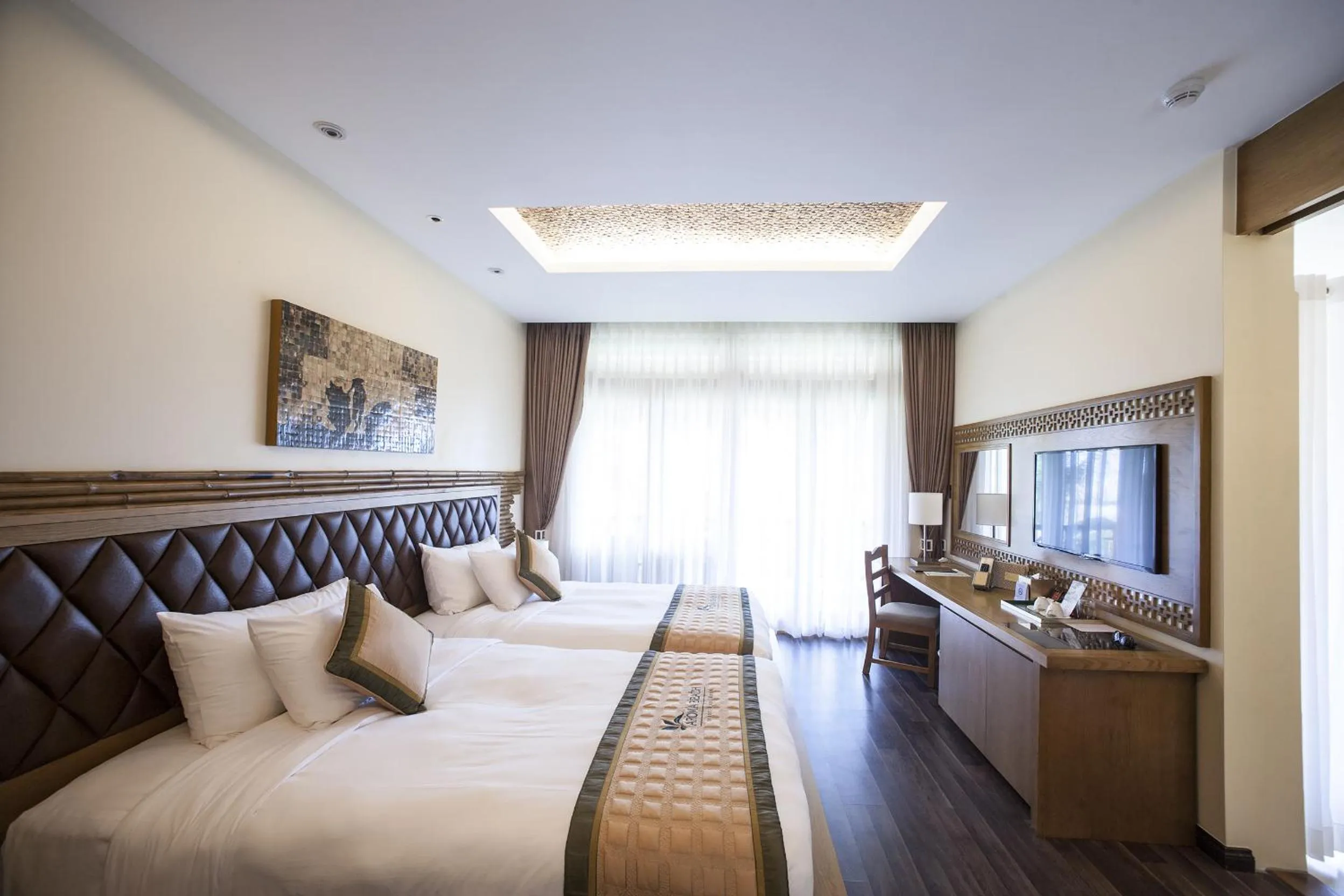 Bed in Aroma Beach Resort and Spa