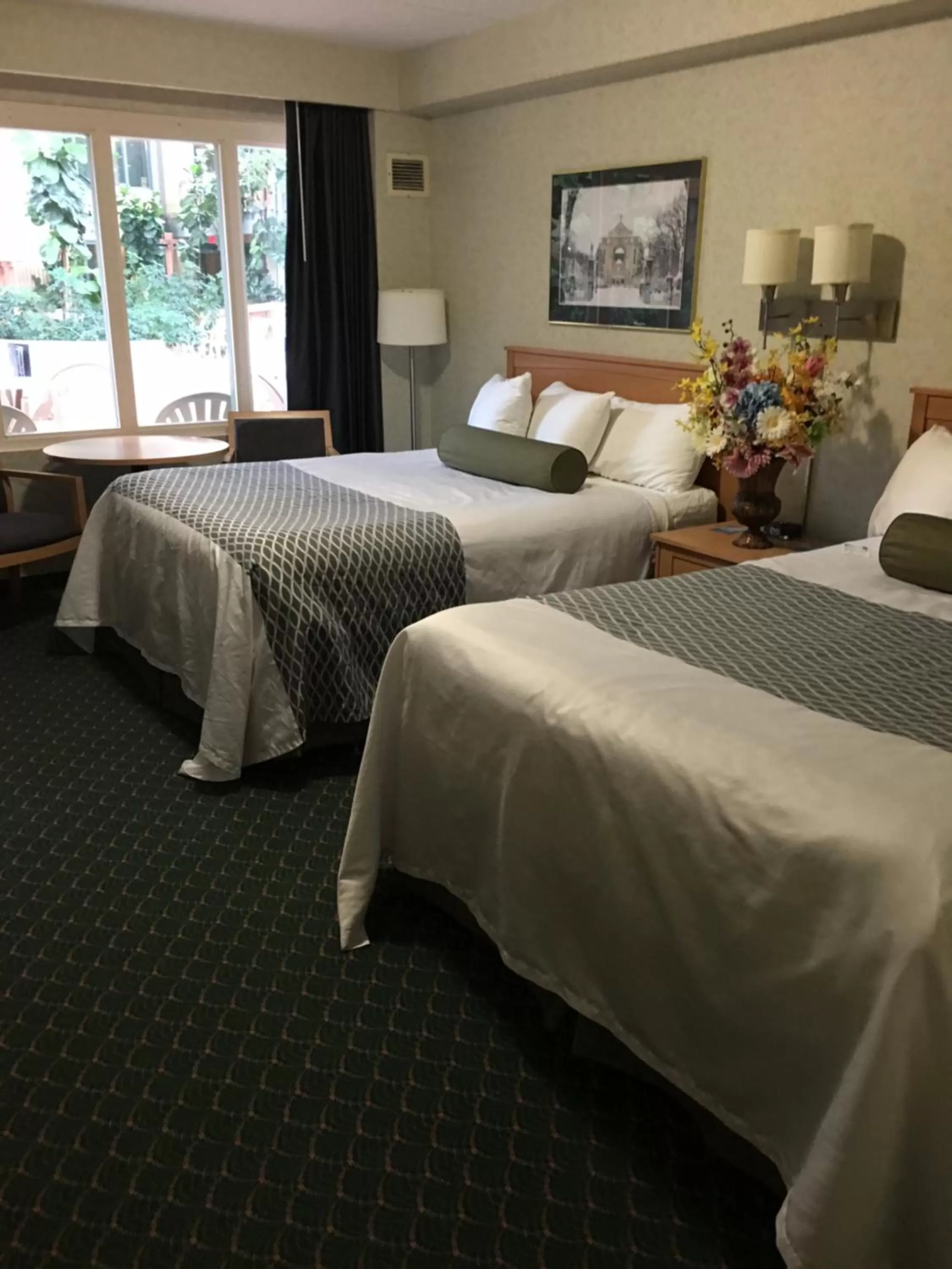 Bed in Travelodge by Wyndham Winnipeg East