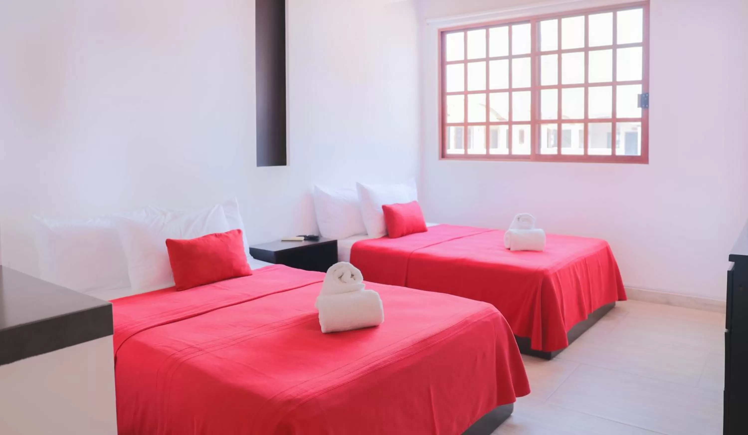 Photo of the whole room, Bed in Hotel Colonial Playa del Carmen