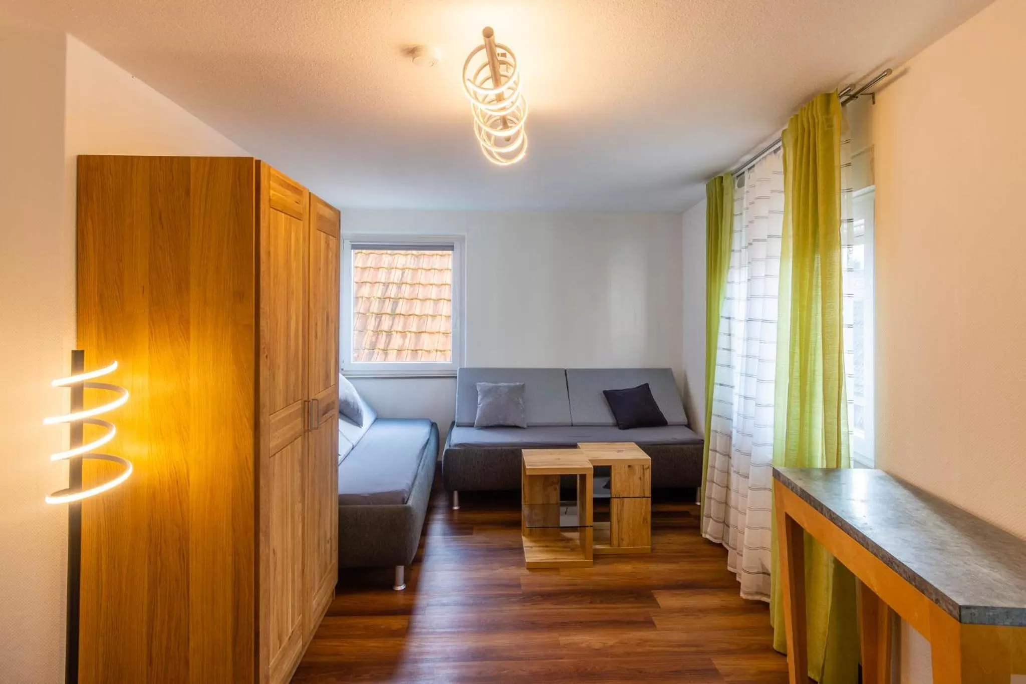 Living room, Bed in Gästehaus Jagsttal