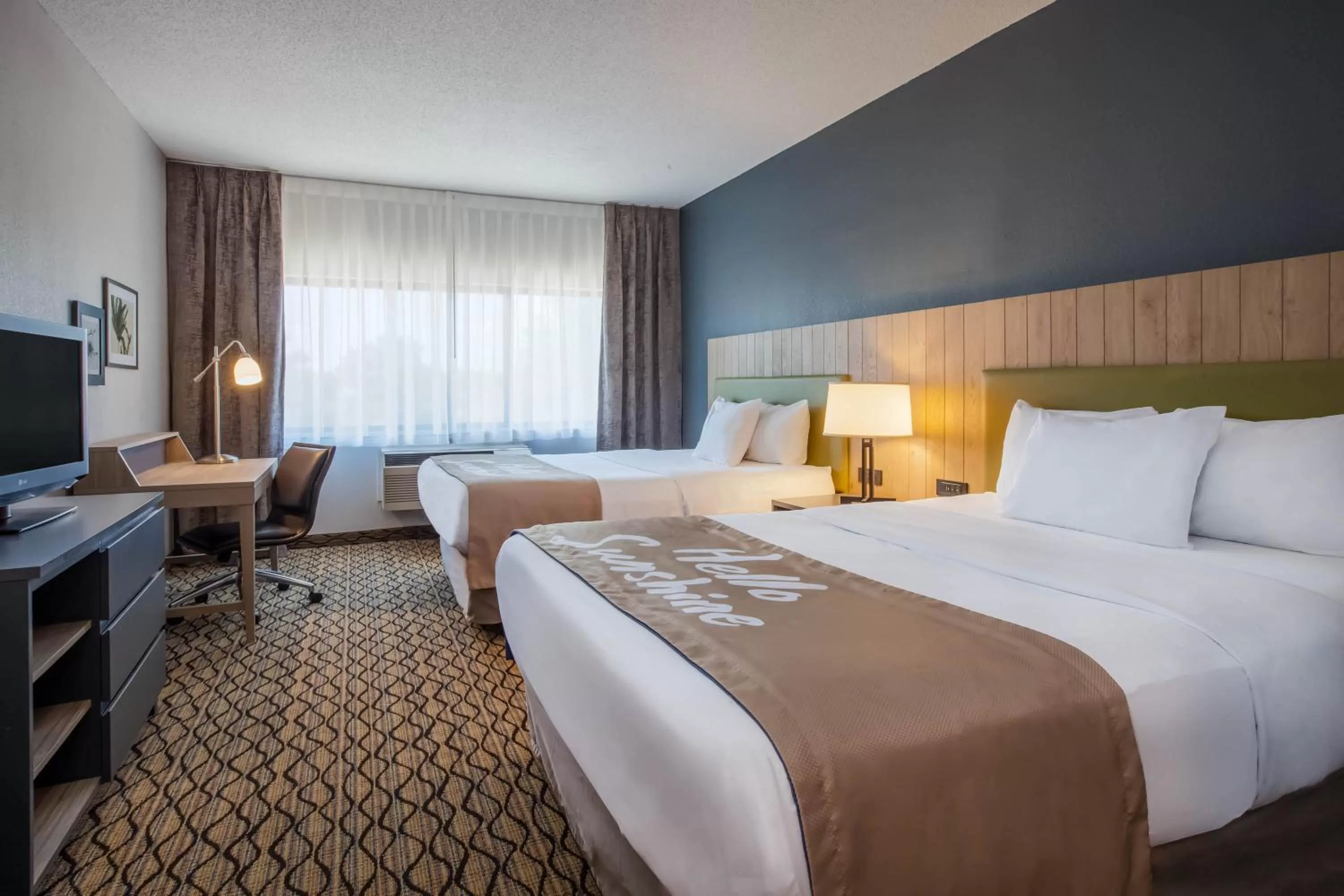 Bedroom, Bed in Days Inn & Suites by Wyndham Rochester Hills MI