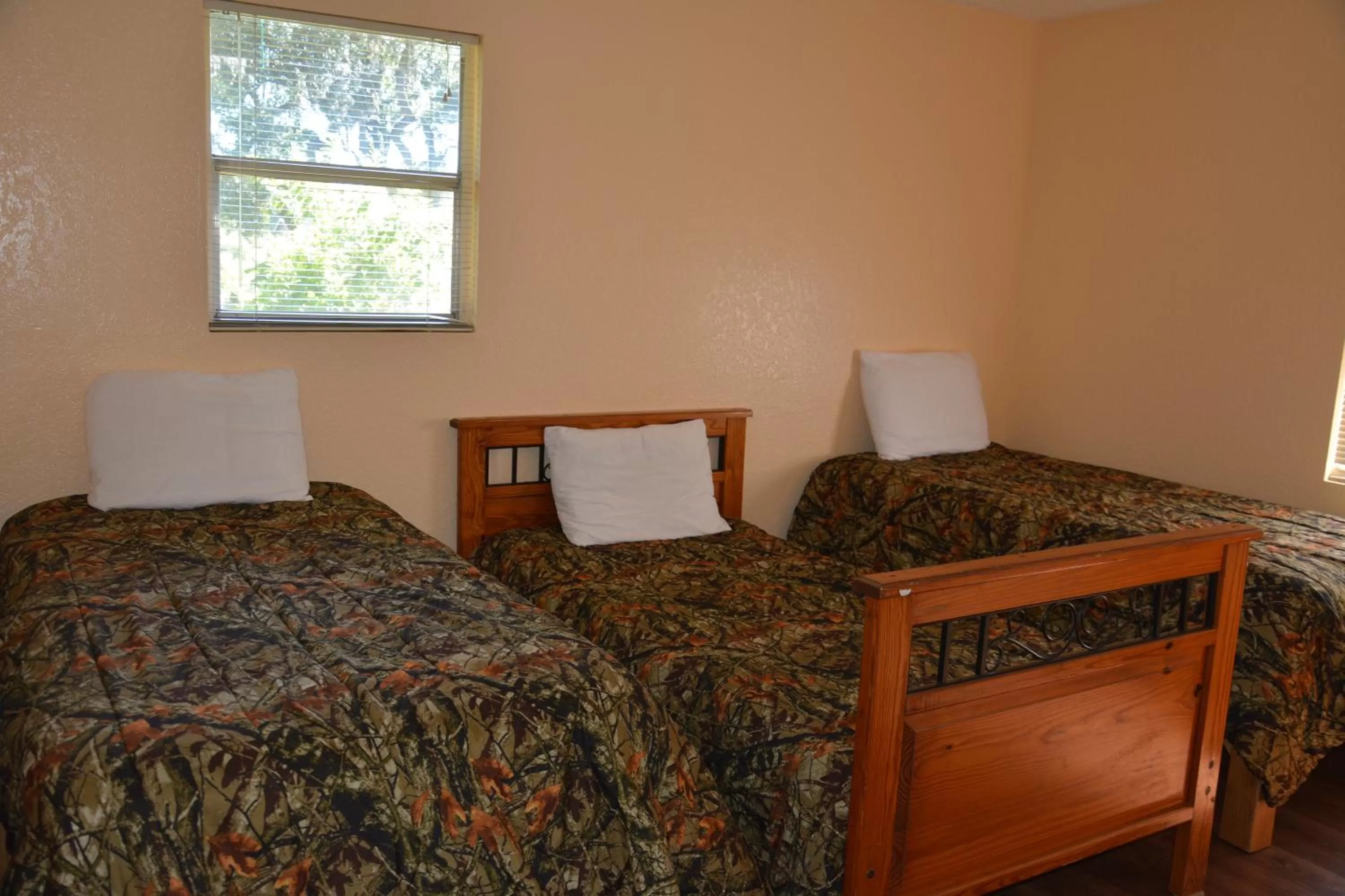 Bed in Camp Mack Lodge, Marina & RV Resort