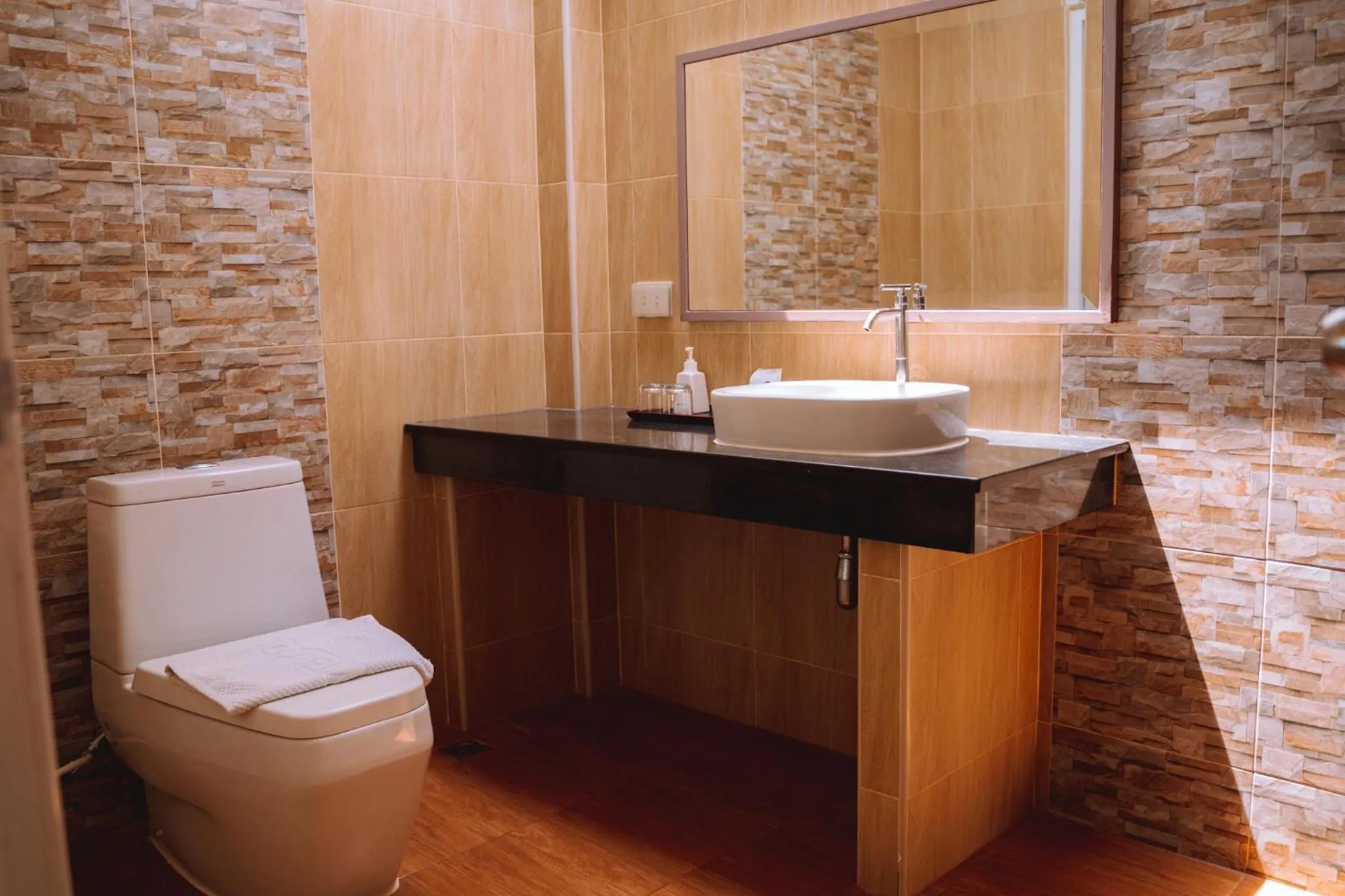 Toilet in Chaolao Tosang Beach Hotel