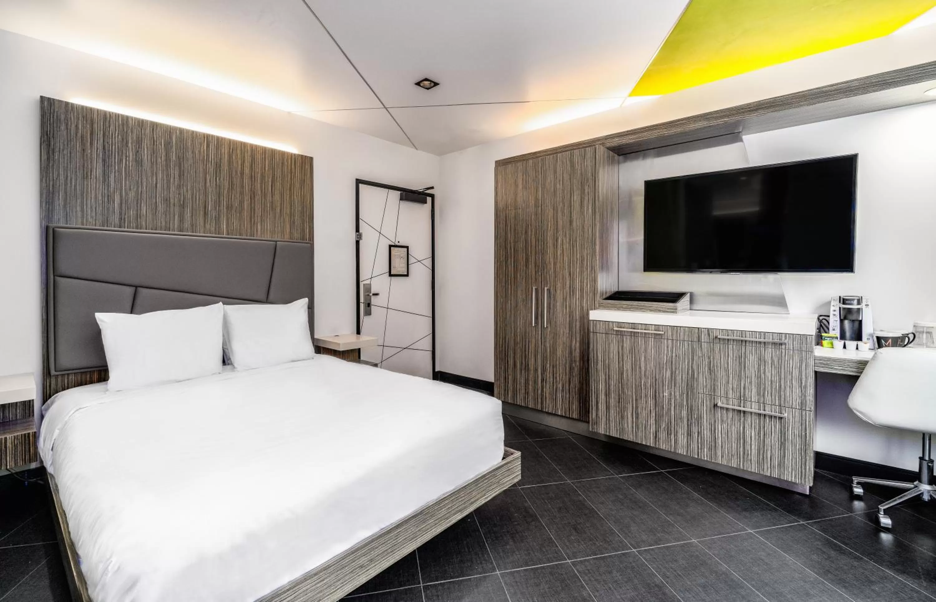 Bed in The Moment Hotel