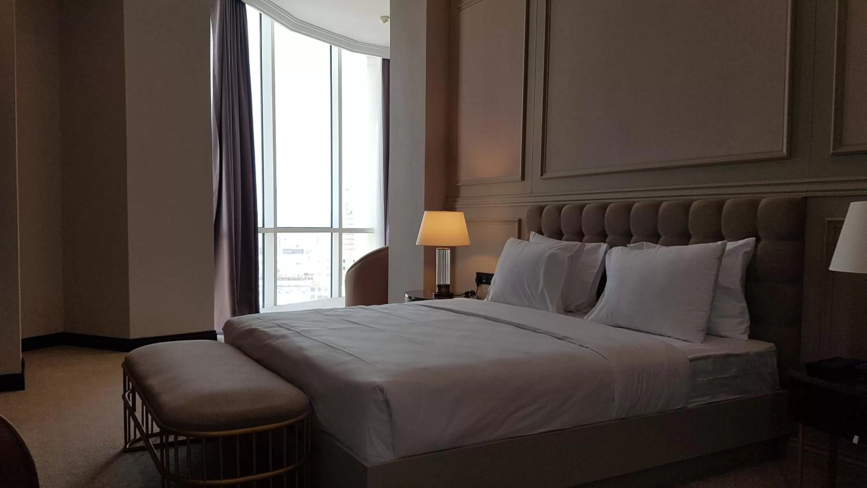 Bed in Horizon Manor Hotel