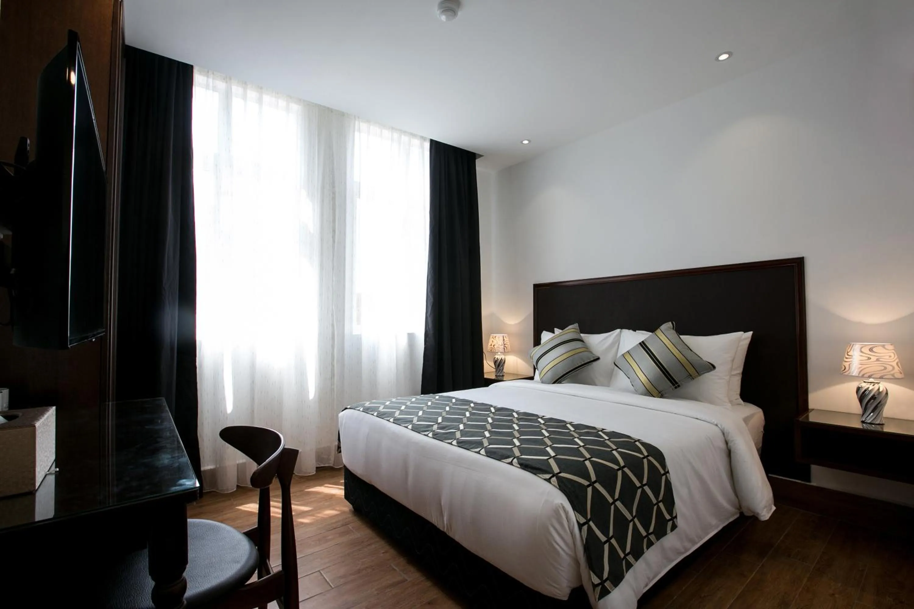 Photo of the whole room, Bed in Belllo Hotel JB Central