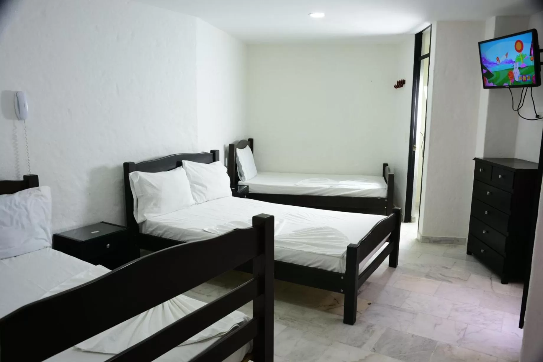 Bed in Blue Star Hotel