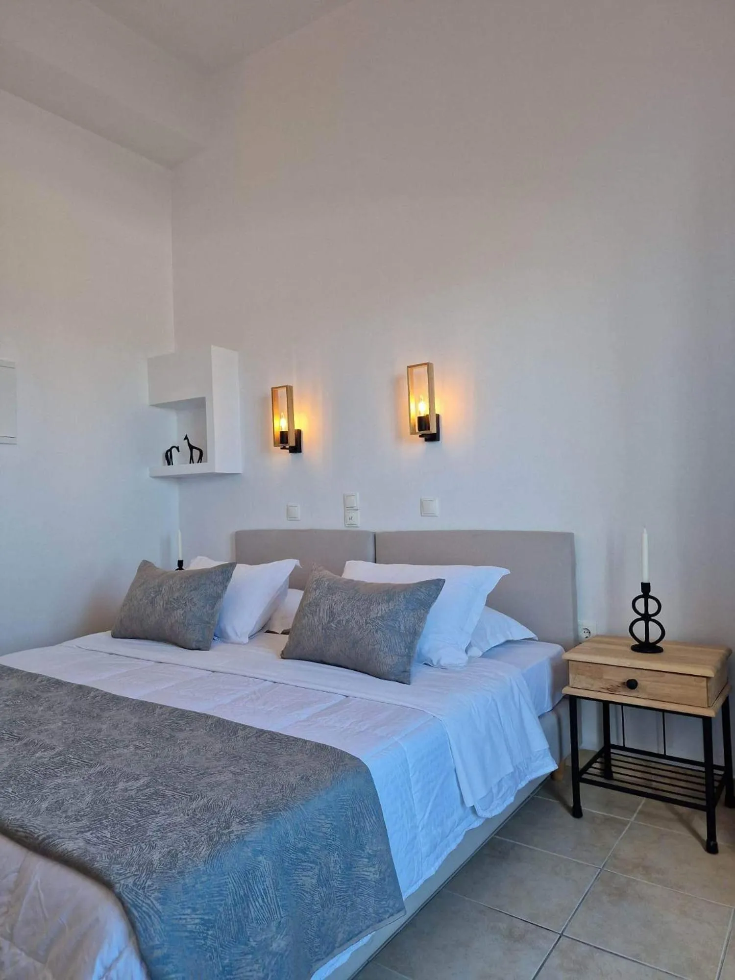 Bed in Amerisa Suites & Villa