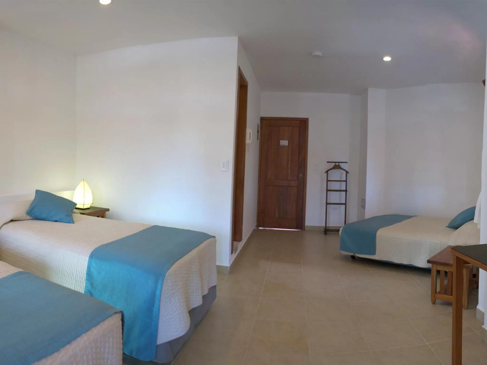 Bedroom, Bed in Hotel Galapagos Suites B&B