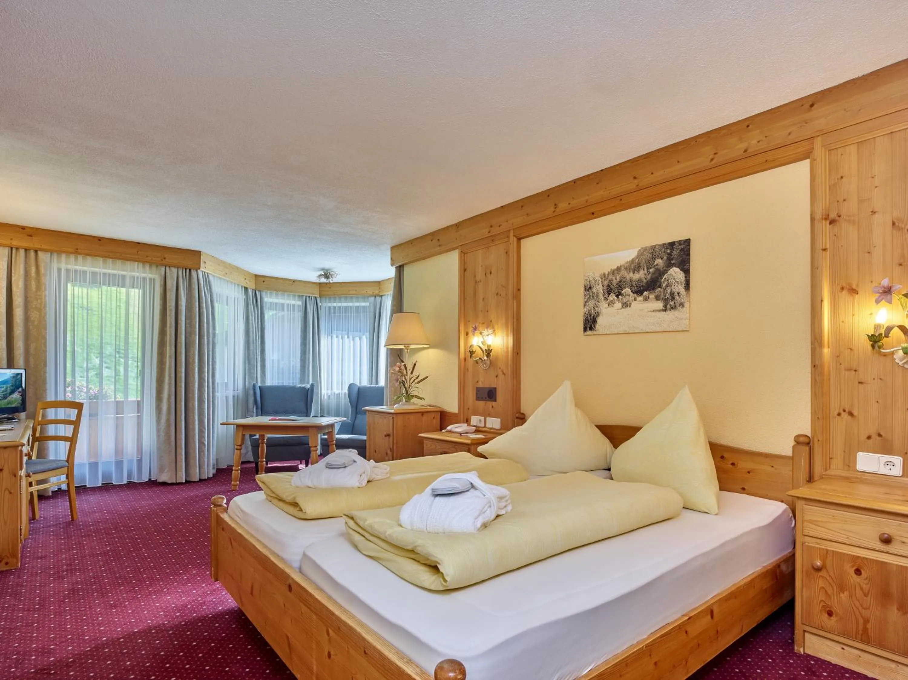 Photo of the whole room, Bed in Hotel Erhart Sölden