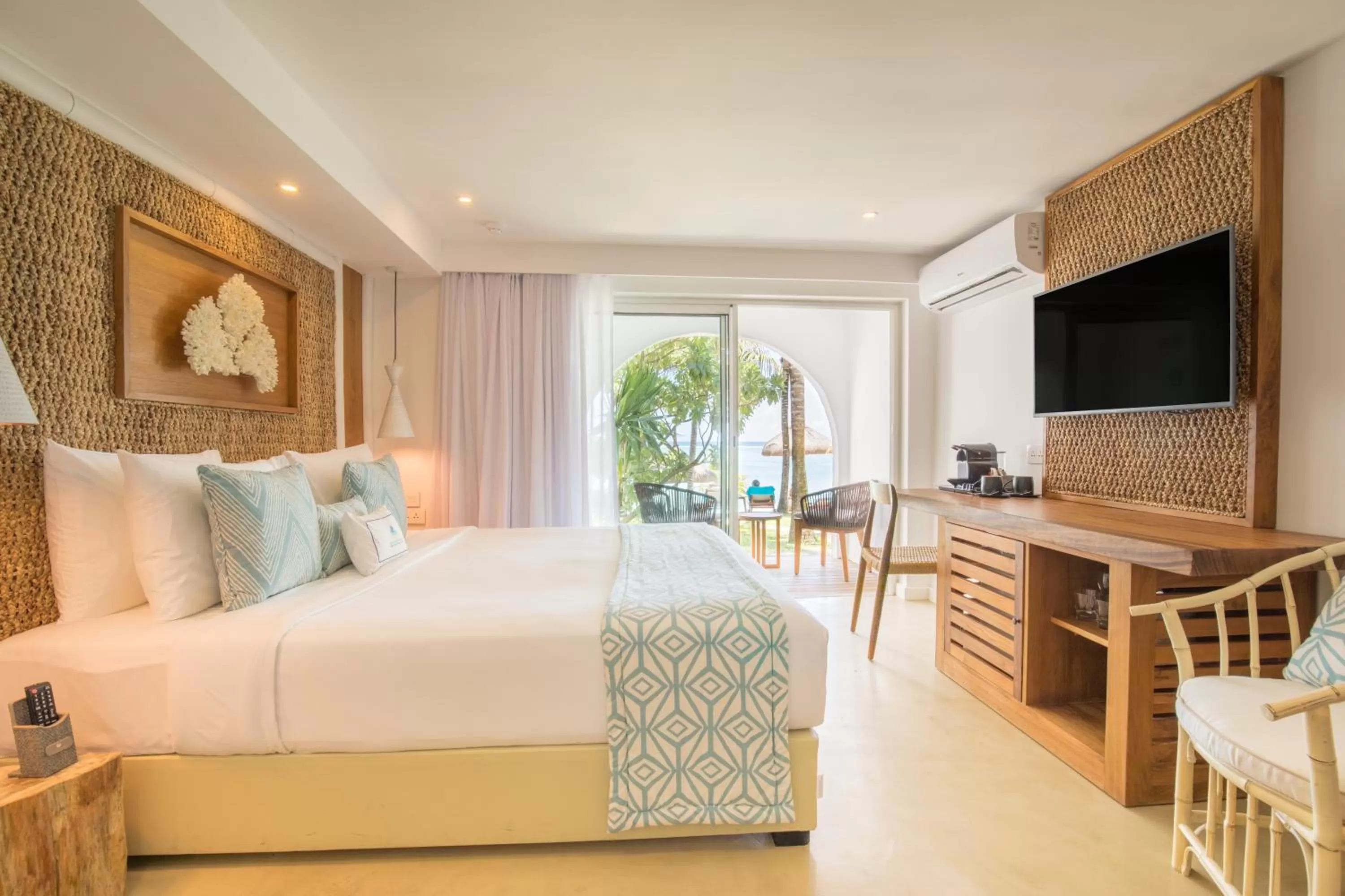 Bed in Seasense Boutique Hotel & Spa