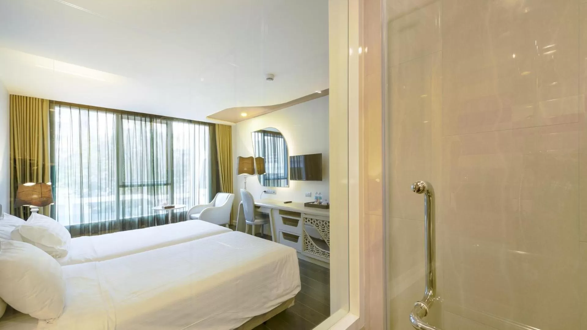 Photo of the whole room, Bed in Le Tada Parkview Hotel