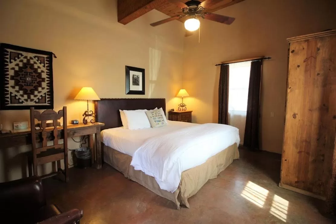 Bed in The Maverick Inn