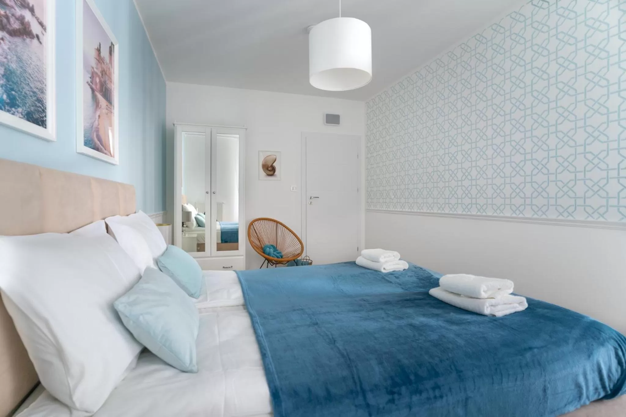 Bed in Symphony Modern Tower Apartamenty