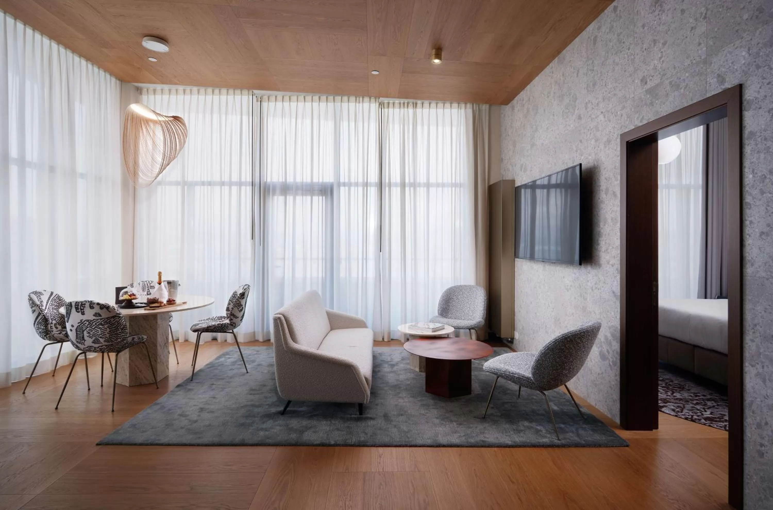 Living room in Iceland Parliament Hotel, Curio Collection By Hilton