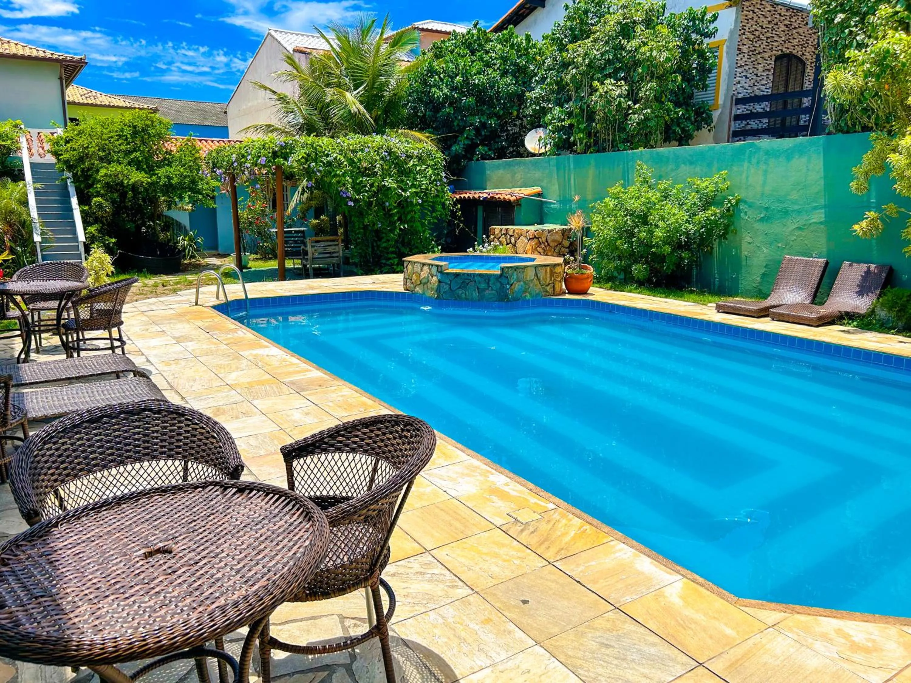 Swimming pool in IBELLO BEACH Pousada