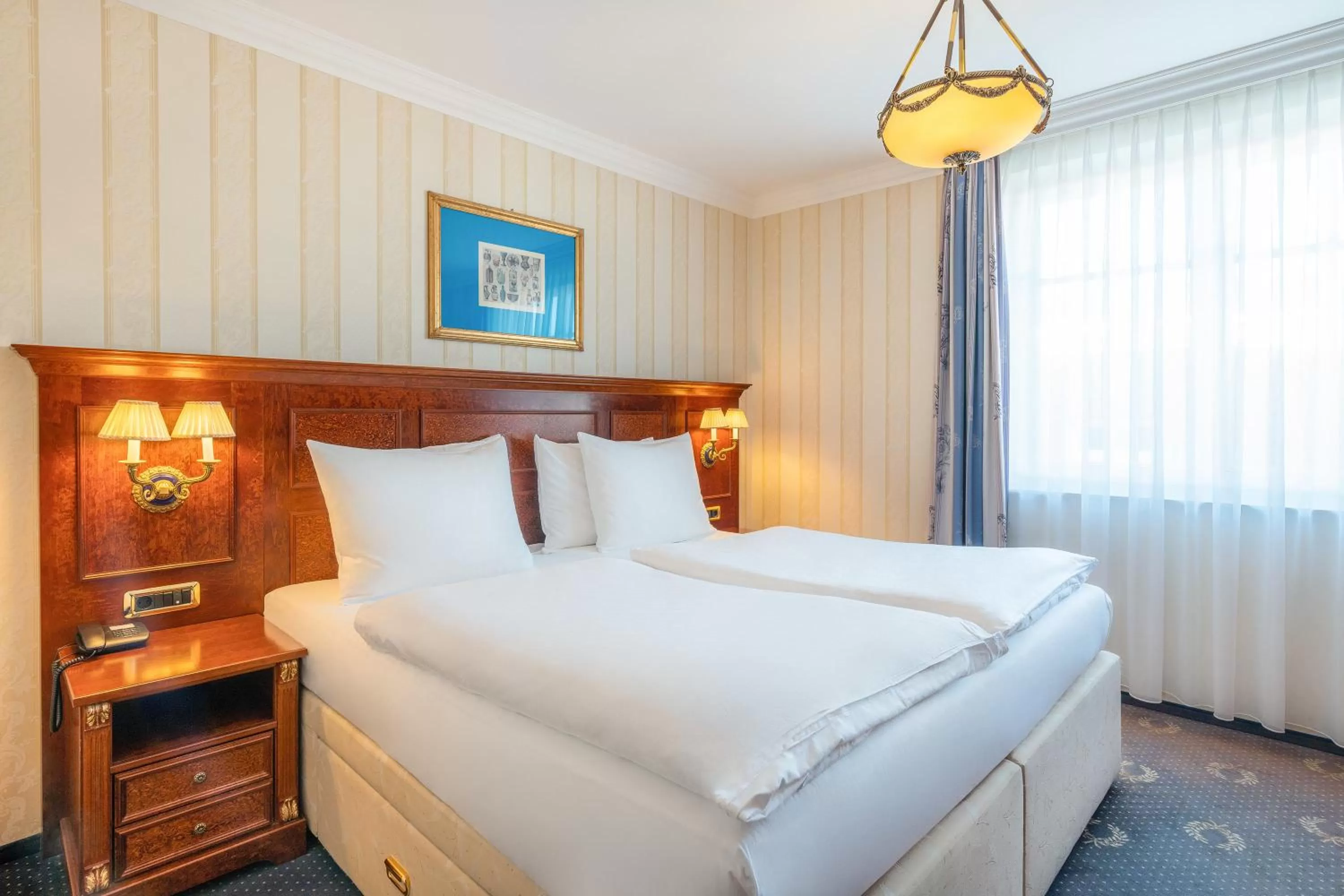 Bed in SEETELHOTEL Ahlbecker Hof das elegante Traditionshotel & ruhiger Rückzugsort an der Ostsee