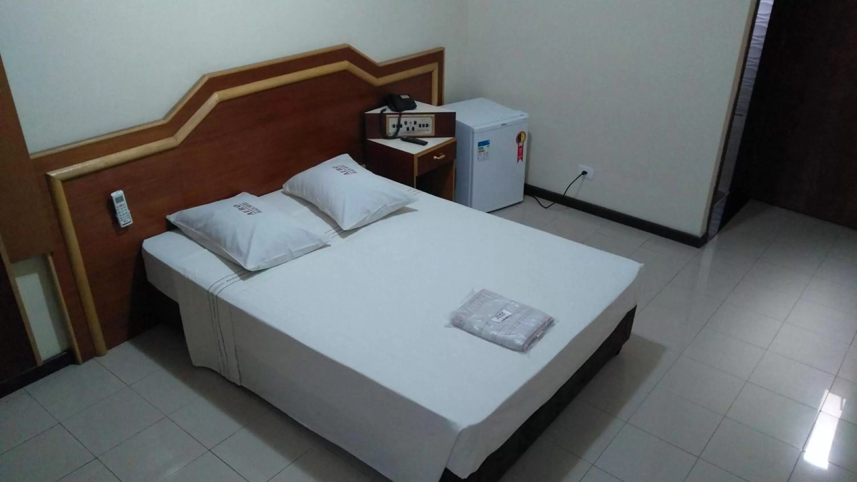 Bed in Aero Plaza Hotel