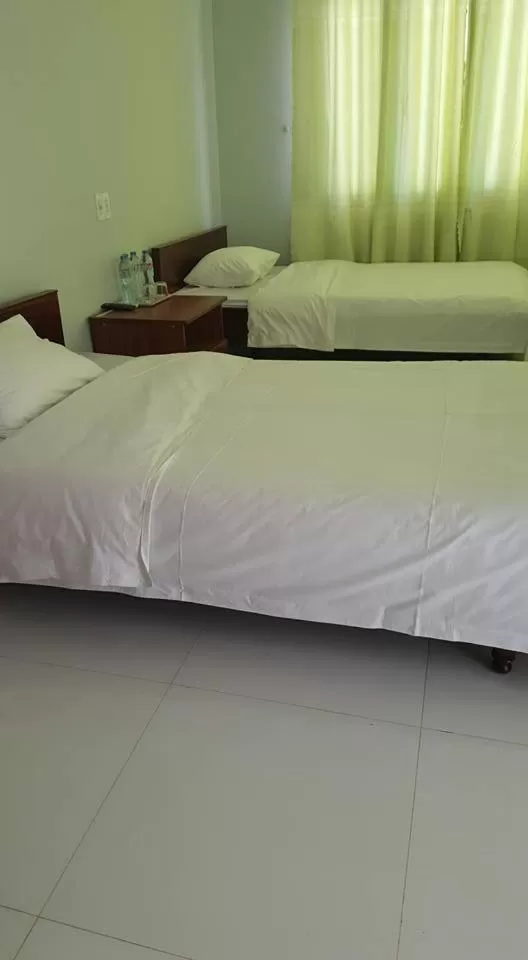 Bed in Cong Doan Gia Lai Hotel