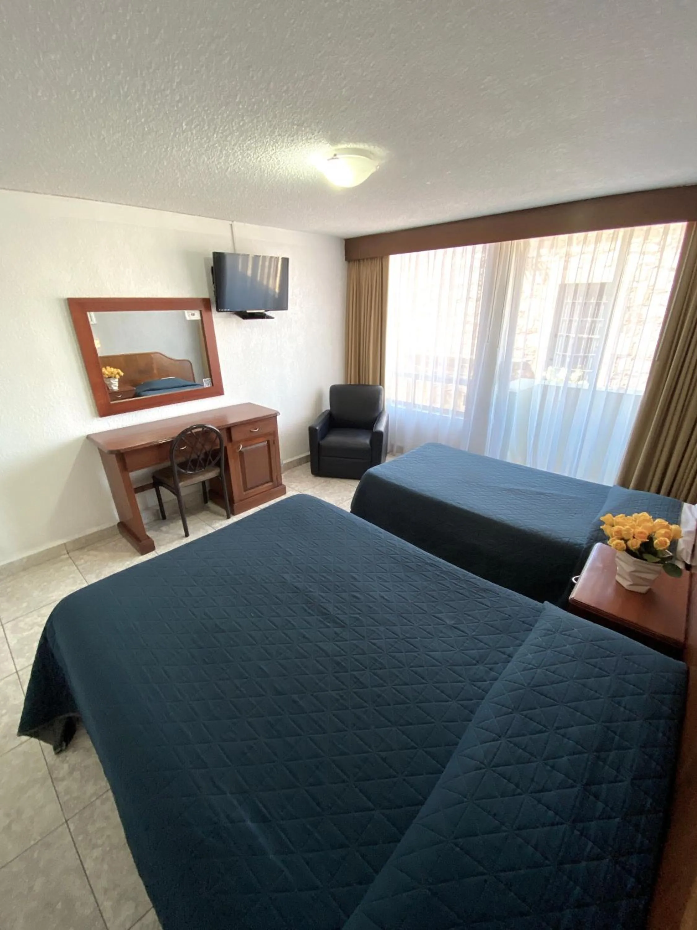 Bed in Hotel Qualitel Plus