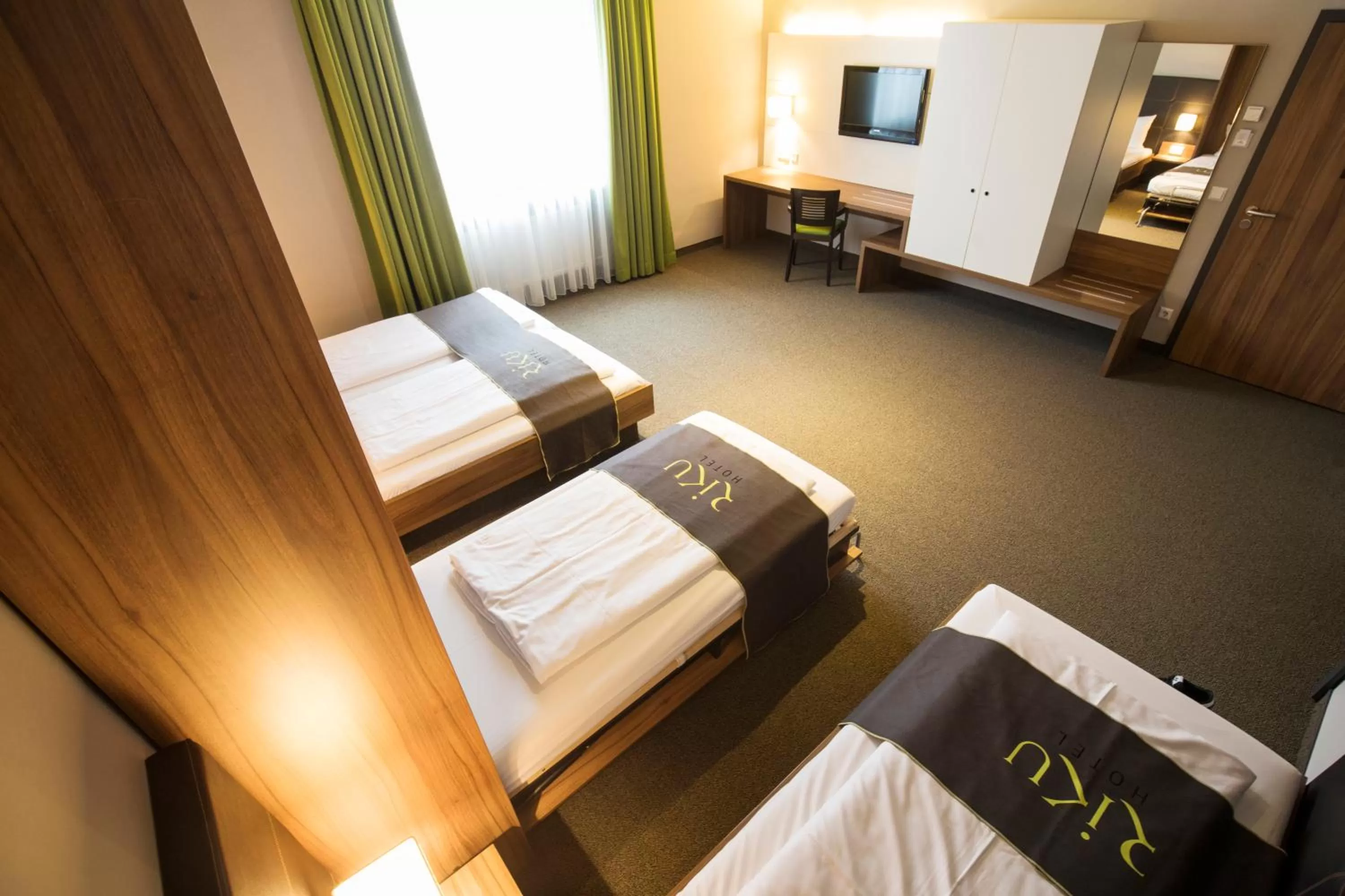 Photo of the whole room, Bed in RiKu HOTEL Neu-Ulm