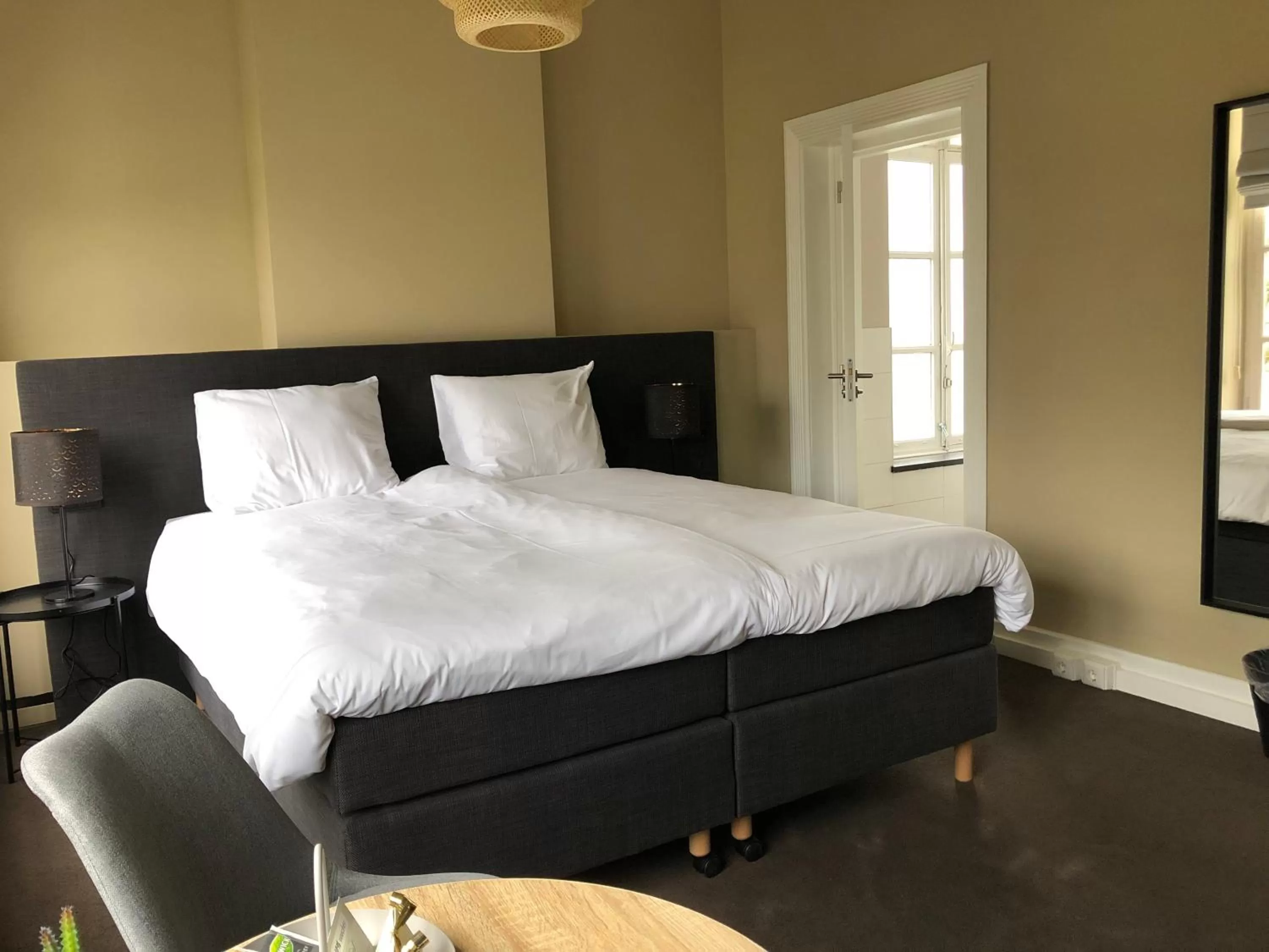 Bed in De Pastorie Bed & Breakfast