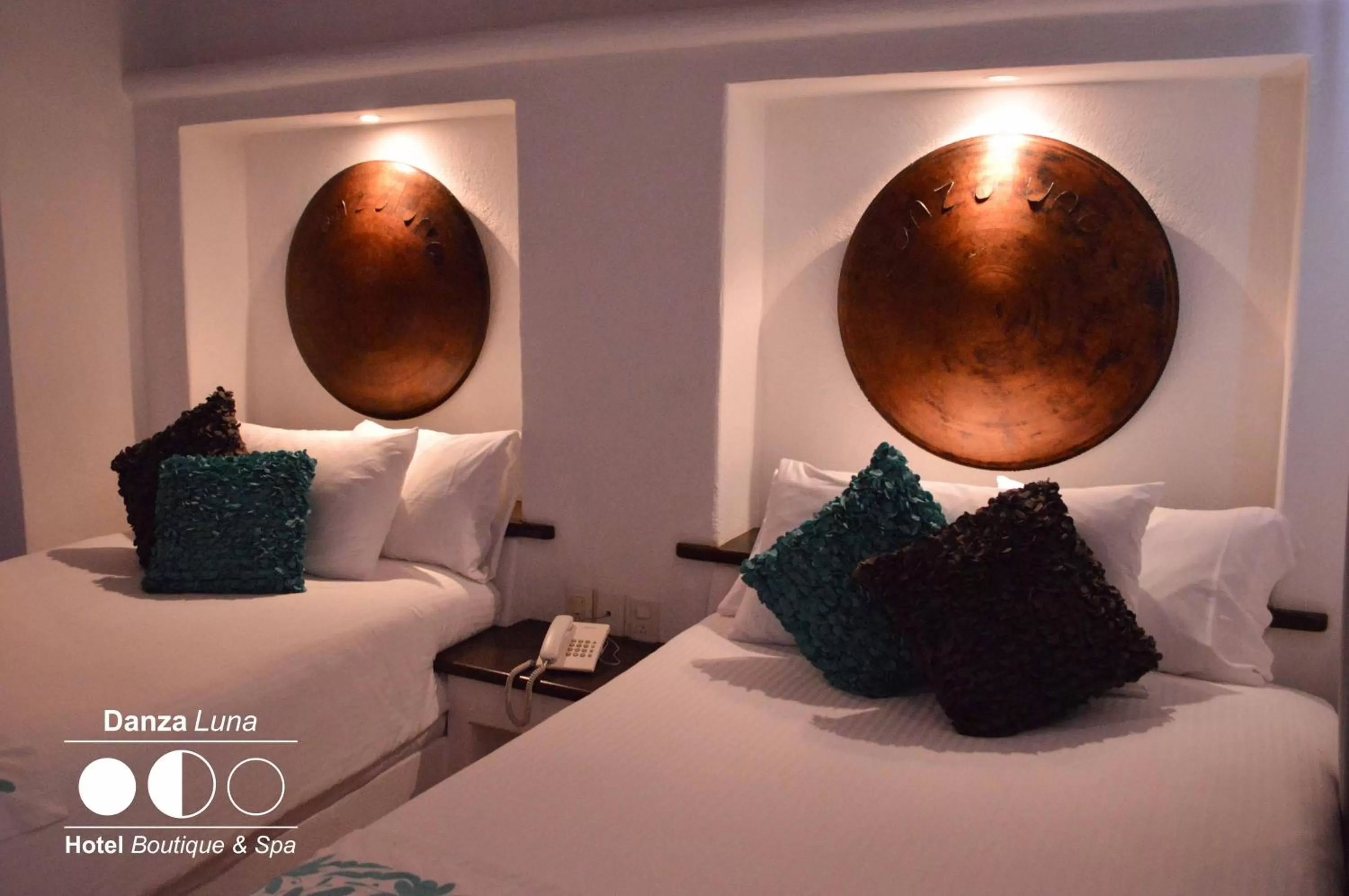 Bed in Danzaluna Hotel Boutique