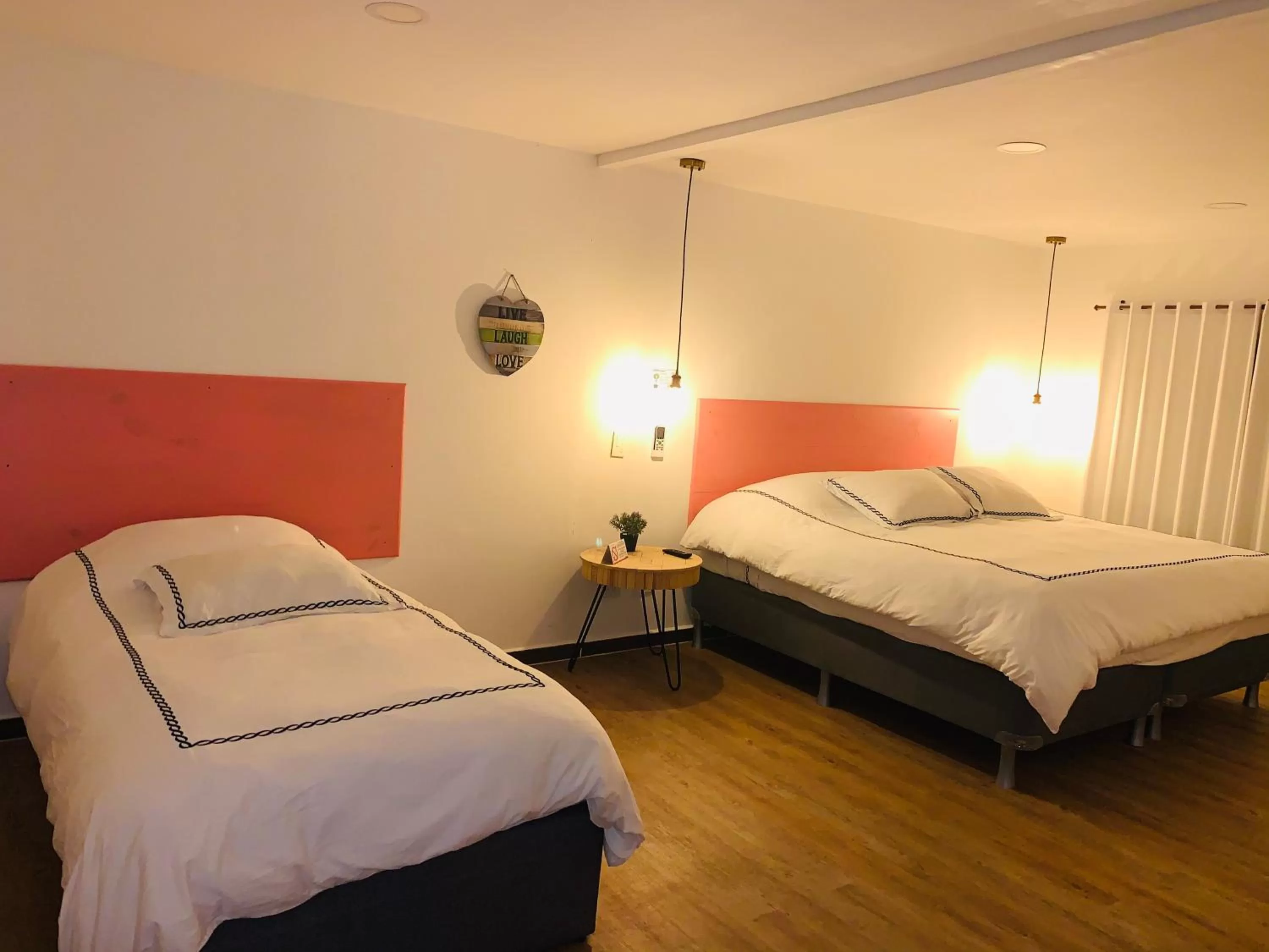 Bed in Be Happy Hotel