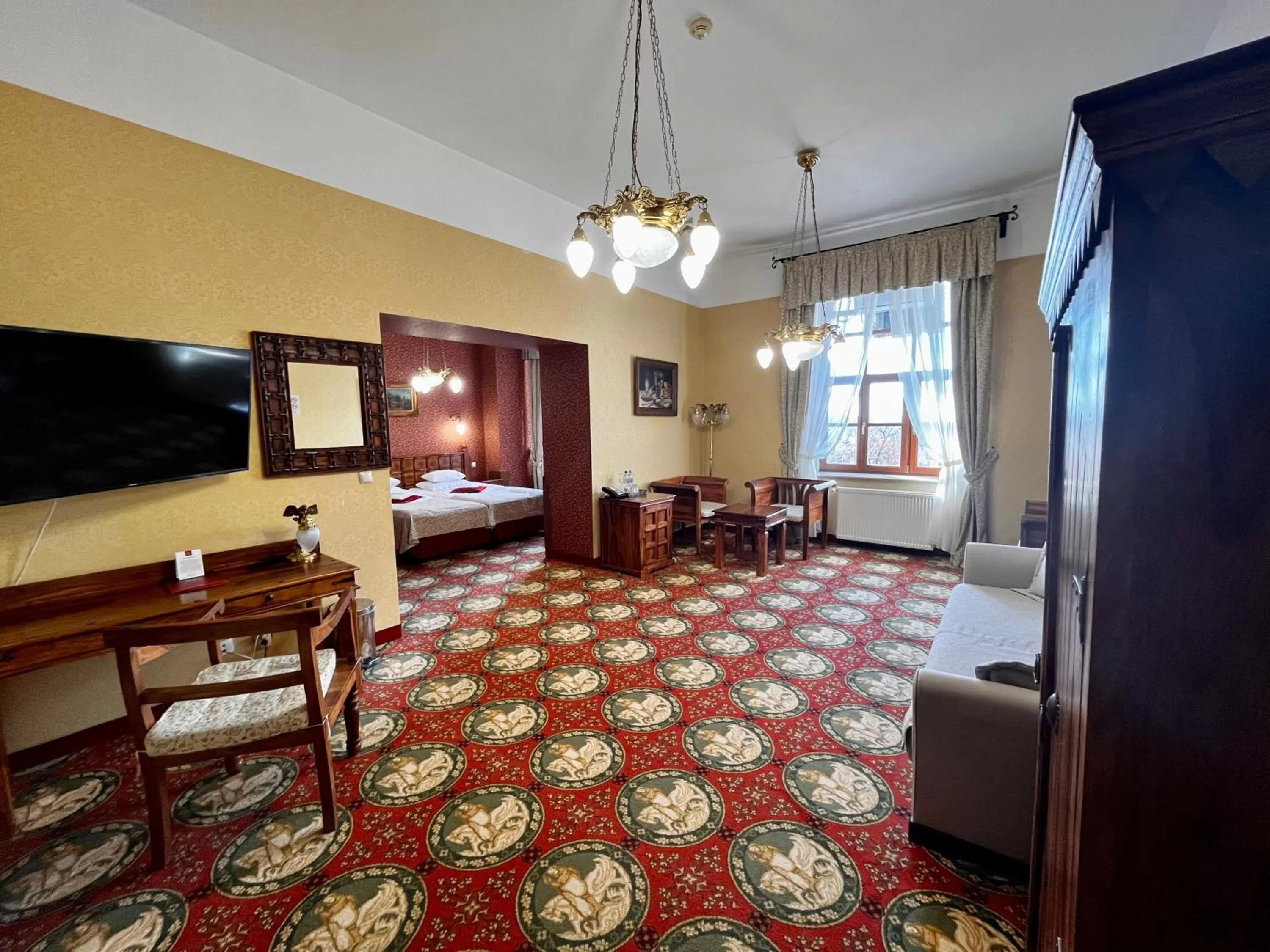 Seating area, Bed in Hotel Zamek Ryn