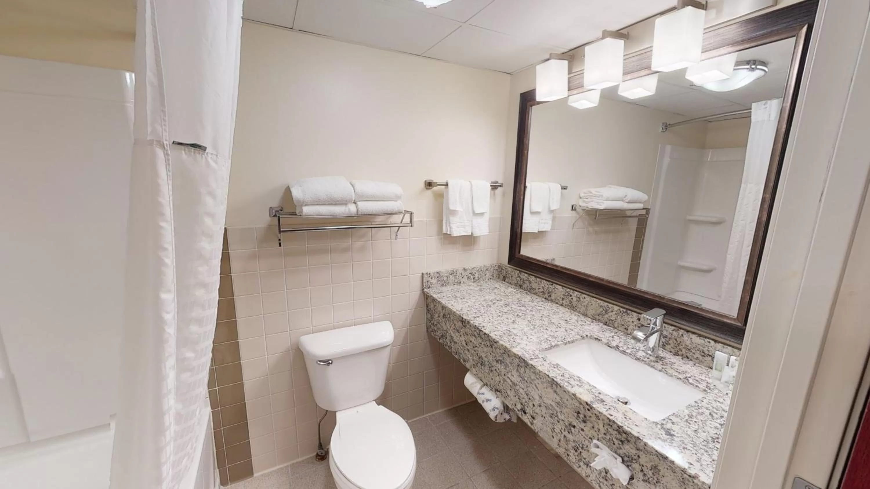 Bathroom in AmericInn by Wyndham Mounds View Minneapolis