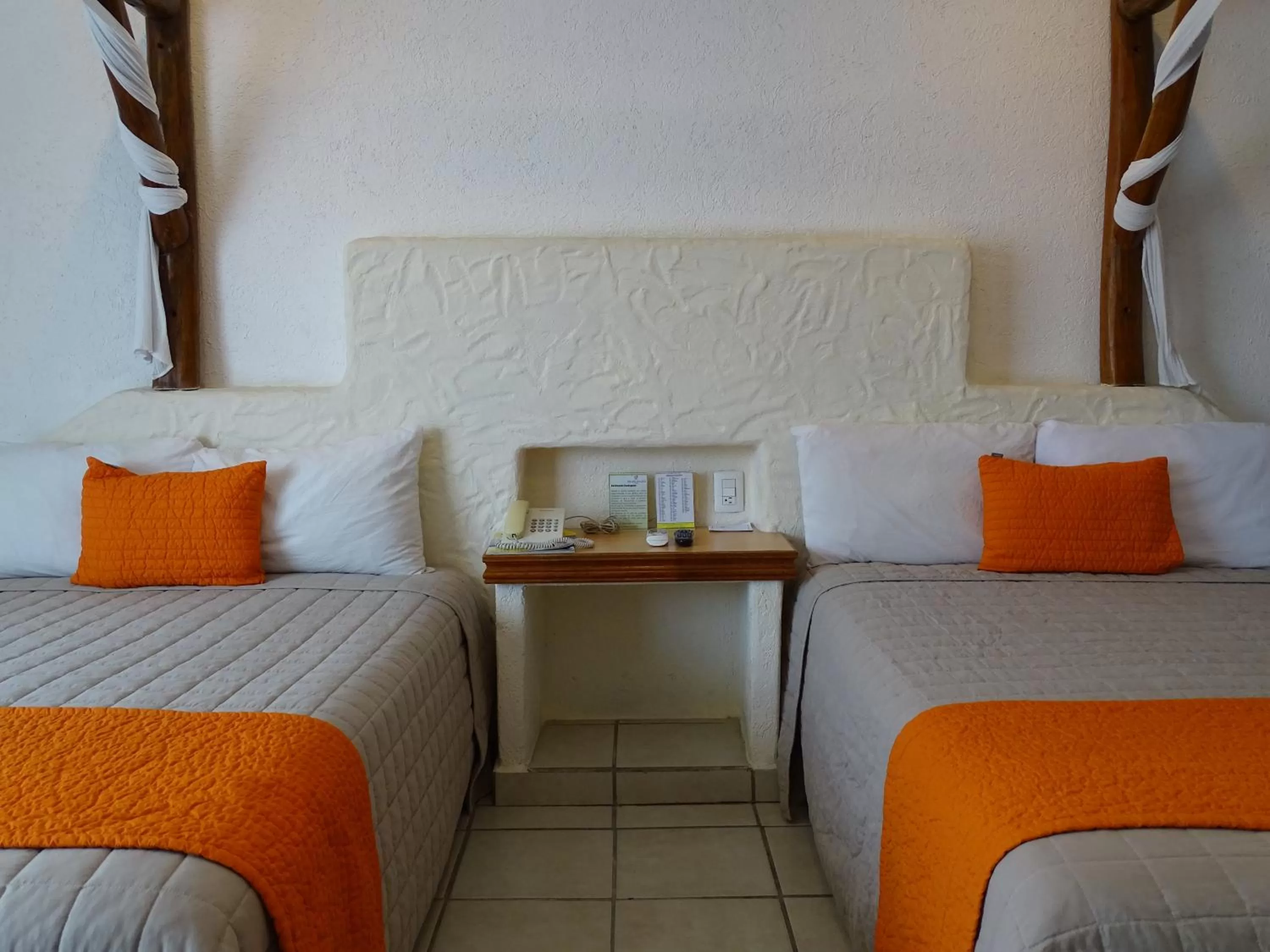 Bed in Hotel Palapa Palace