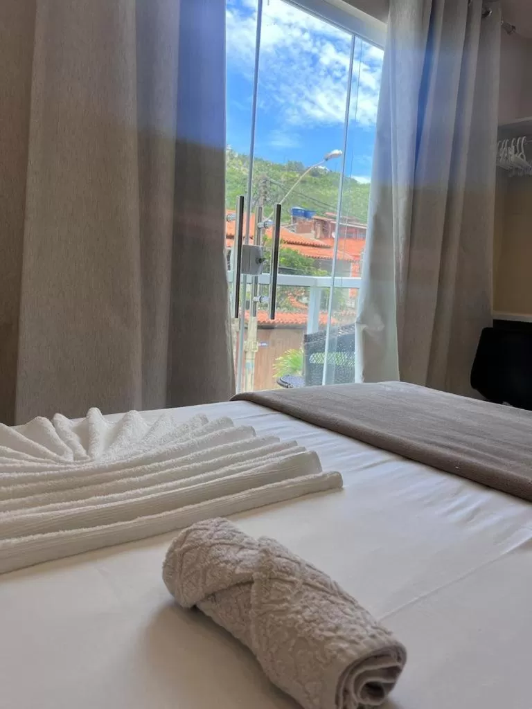 Bed in Pousada Arraial Tropical