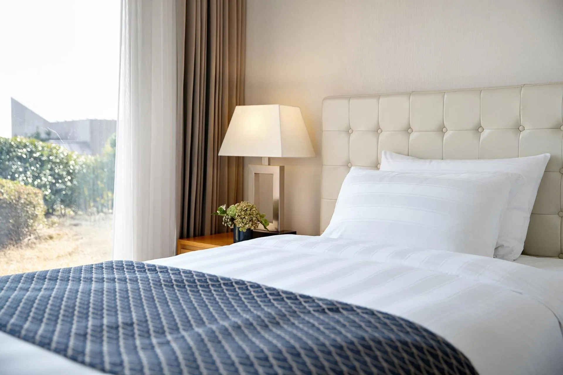 Bed in Lotte Resort Jeju Artvillas