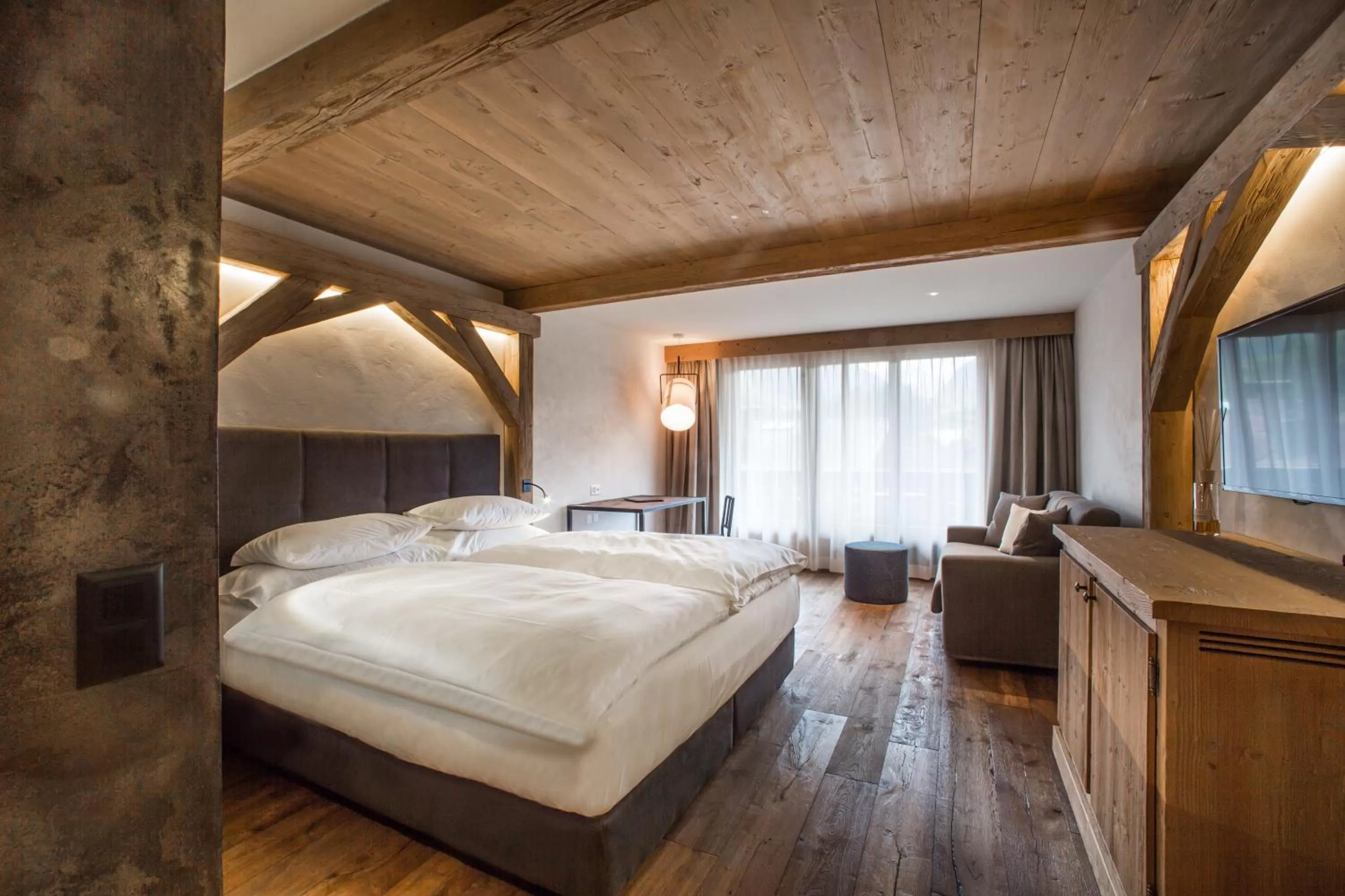 Photo of the whole room, Bed in Bernerhof Swiss Quality Hotel Gstaad