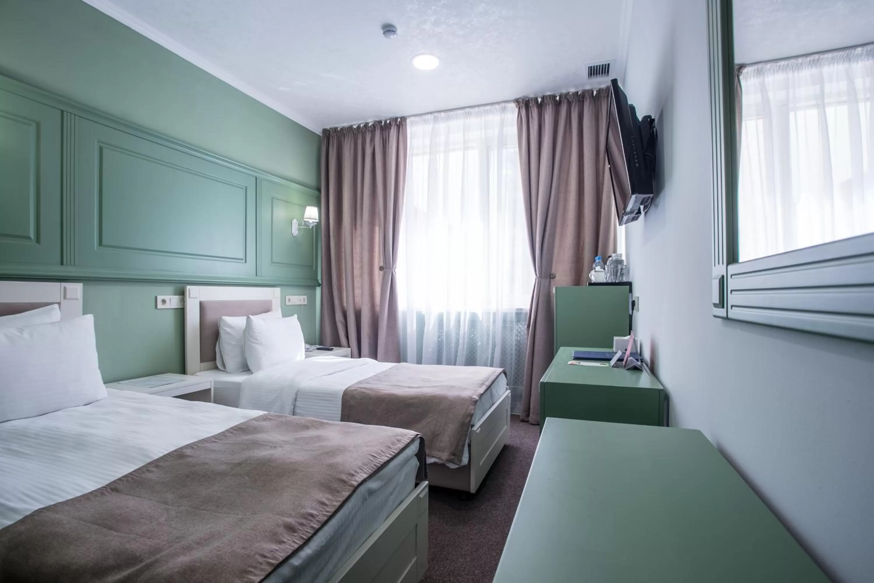 Bed in Grand Sapphire Hotel