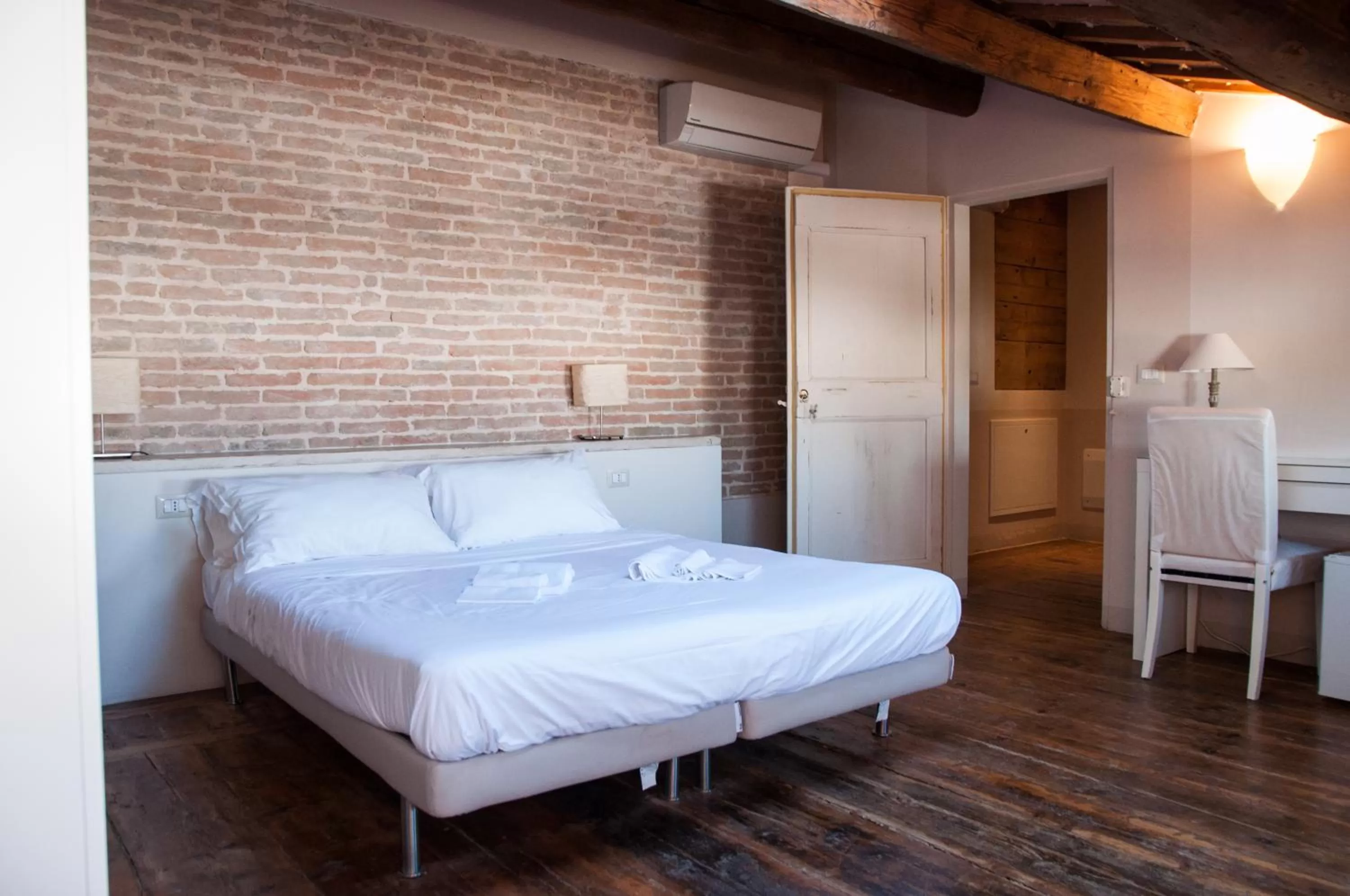 Bed in Relais Casetta56