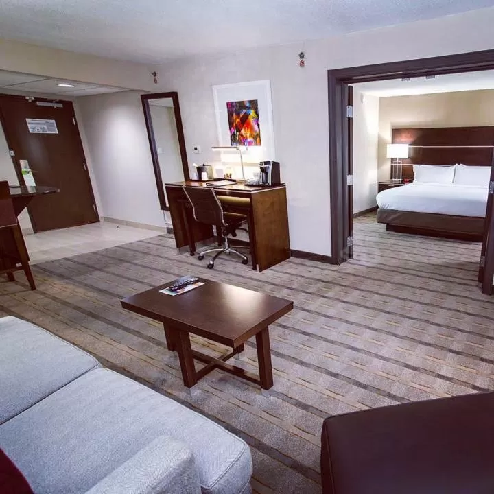 Living room, Bed in Holiday Inn Charlotte Airport by IHG