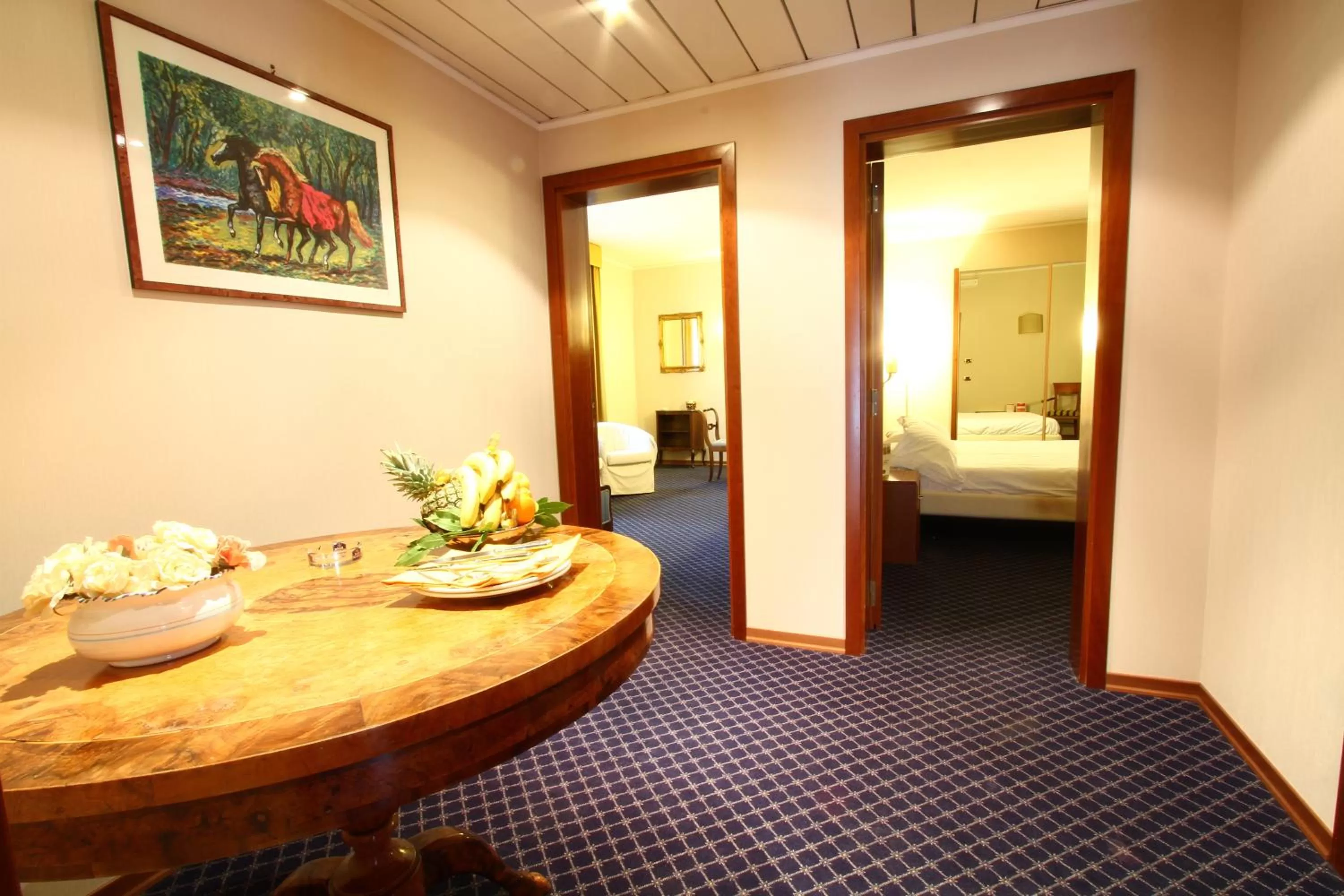 Seating area, Bed in Hotel Garden Terni