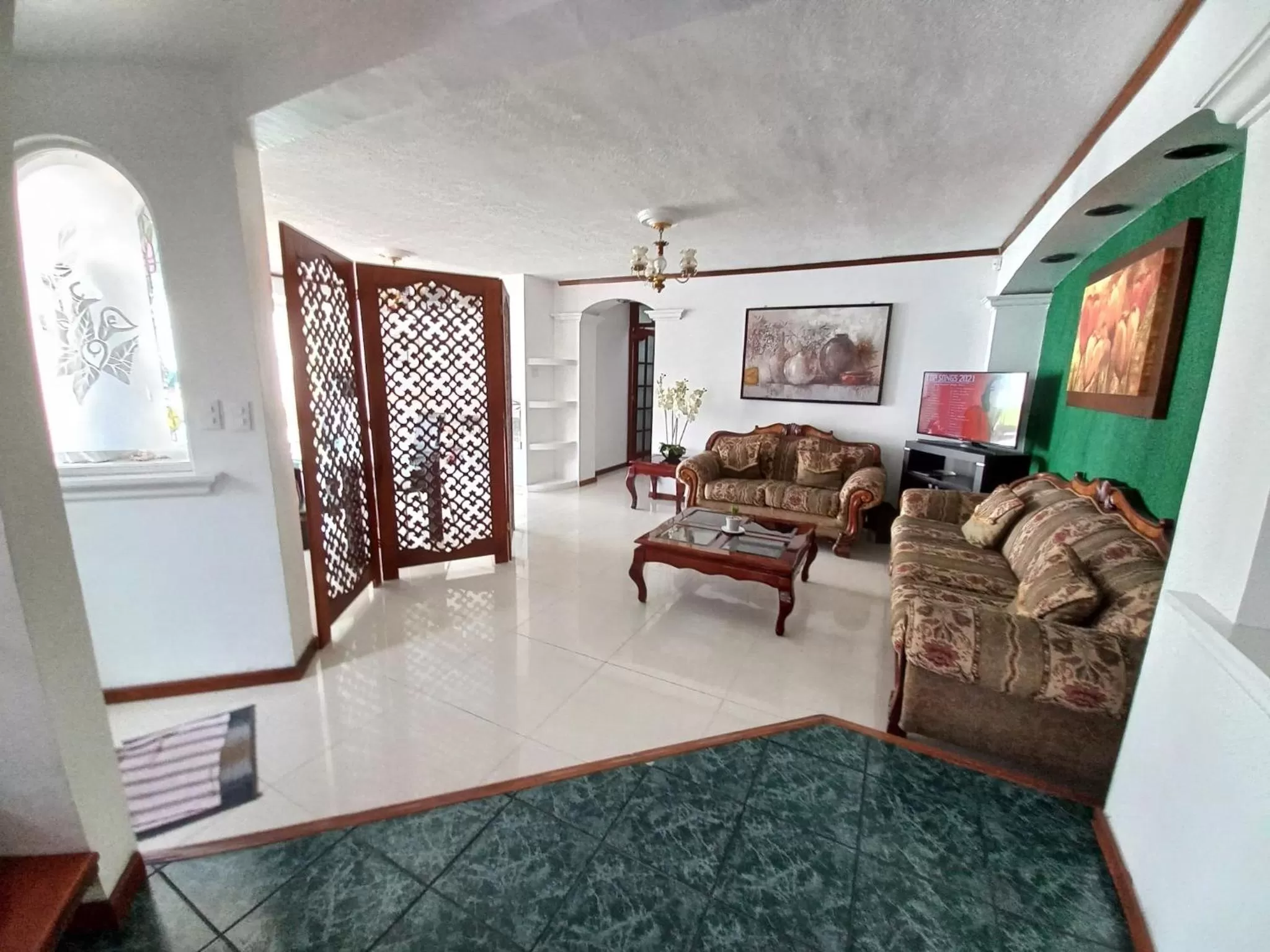 Living room in La Aurora Hotel Like Home