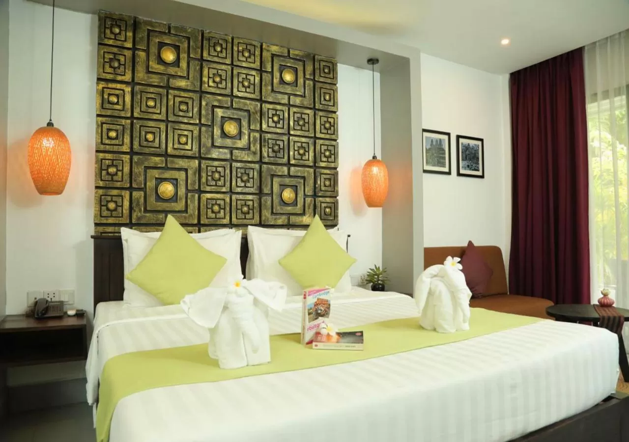 Bed in Ladear Privilege Rooms