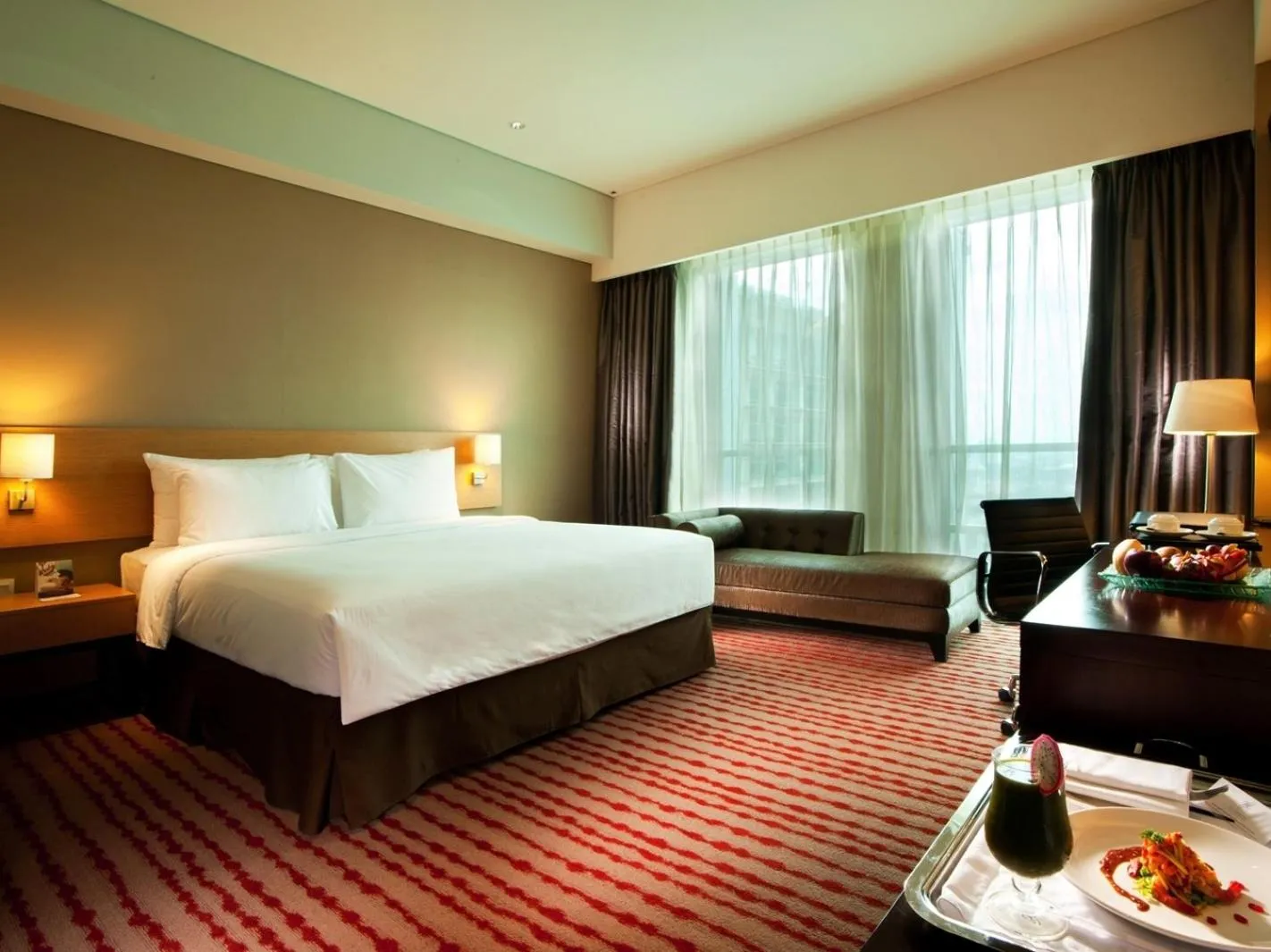 Bed in JS Luwansa Hotel & Convention Center