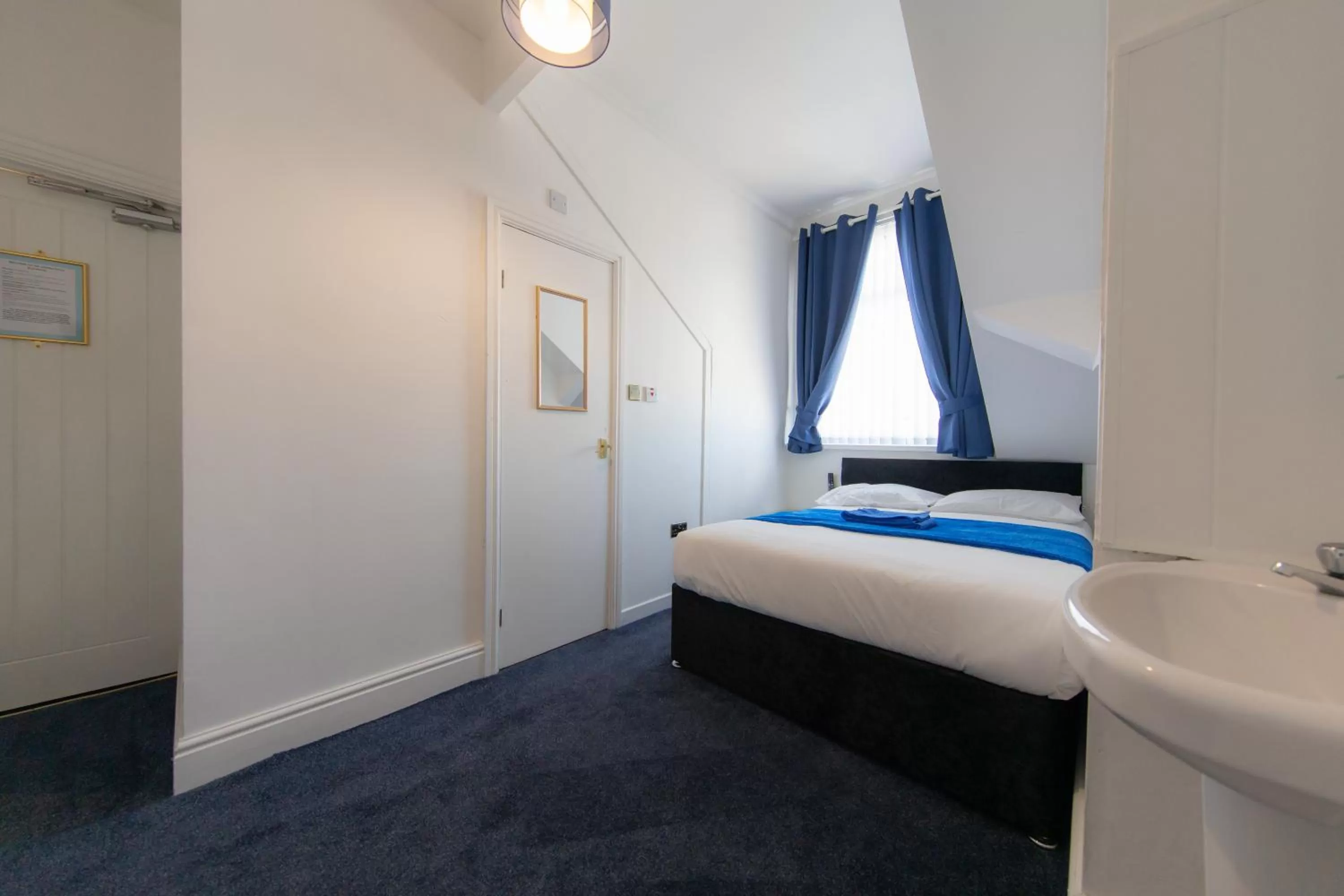 Bed in The Adonis Hotel