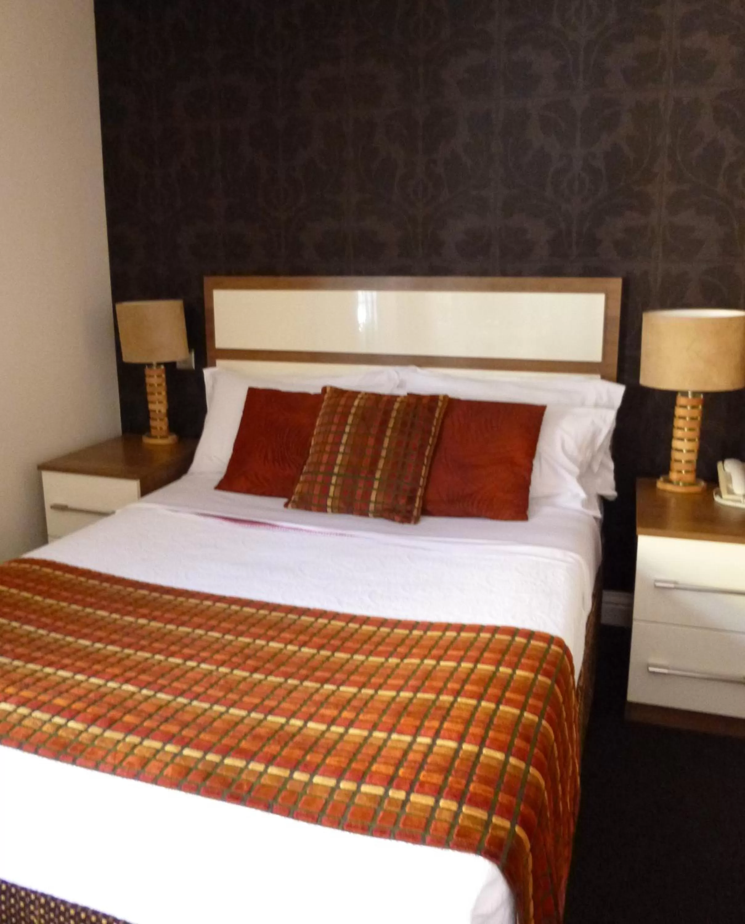 Bed in The White Lady Hotel