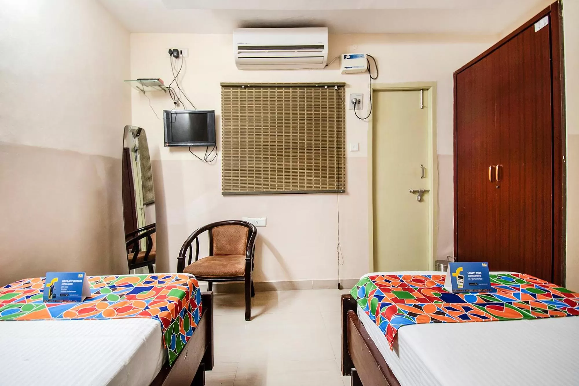 Bedroom, TV/Entertainment Center in FabHotel Aditya Yatri Nivas